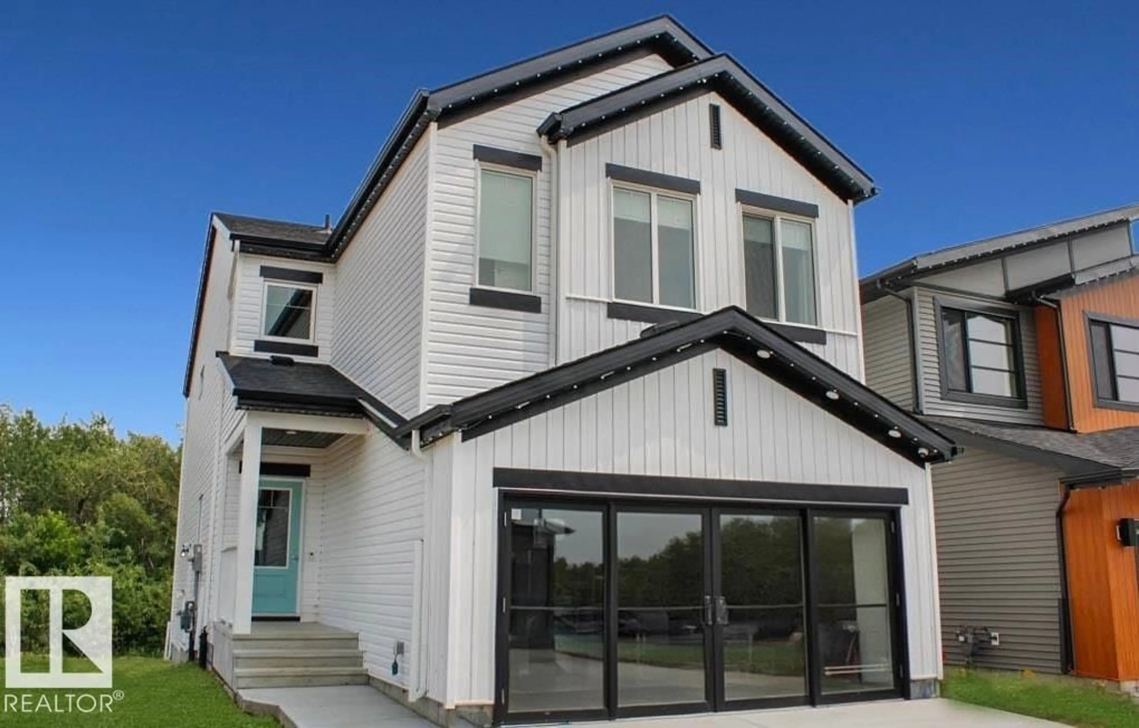 Home with vinyl exterior material, street for 8612 183 AV, Edmonton Alberta T5Z0X5