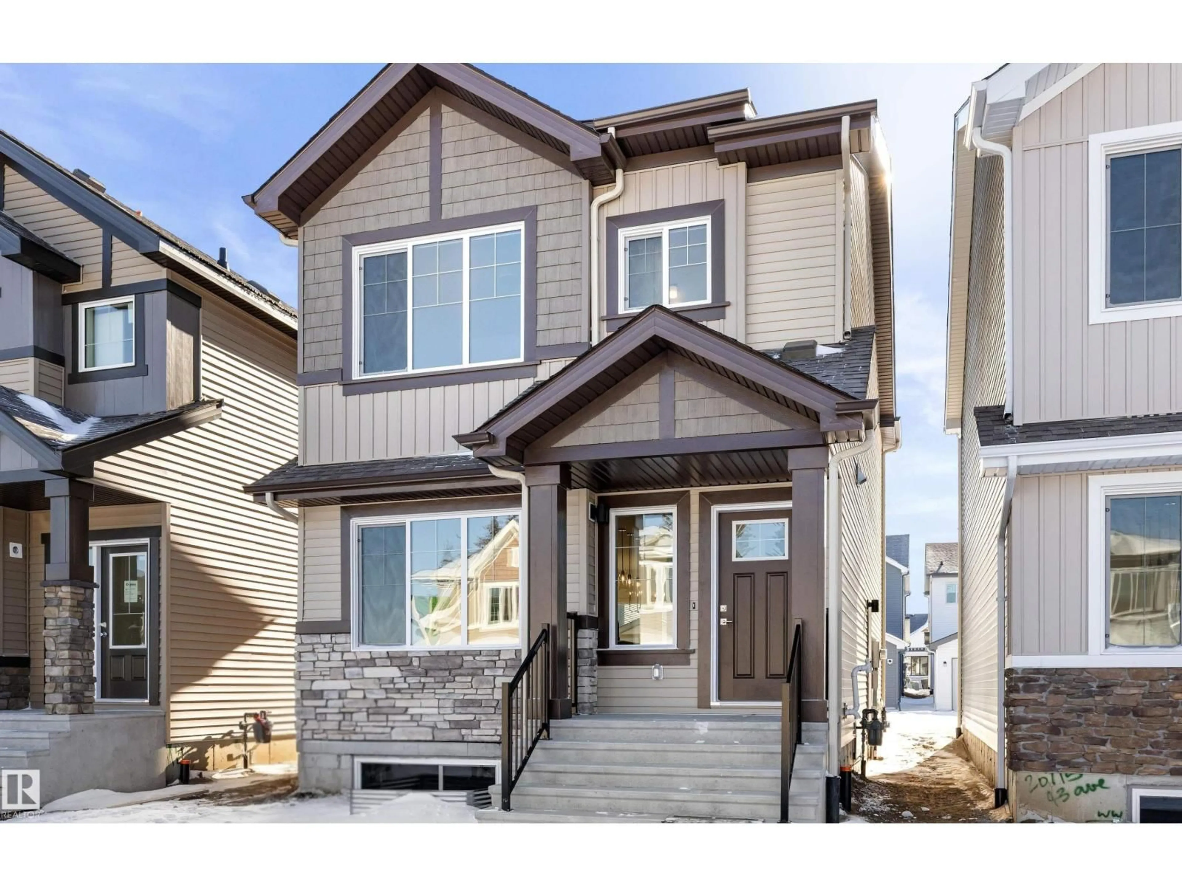 Home with vinyl exterior material, street for 20711 43 AV, Edmonton Alberta T6M3E3