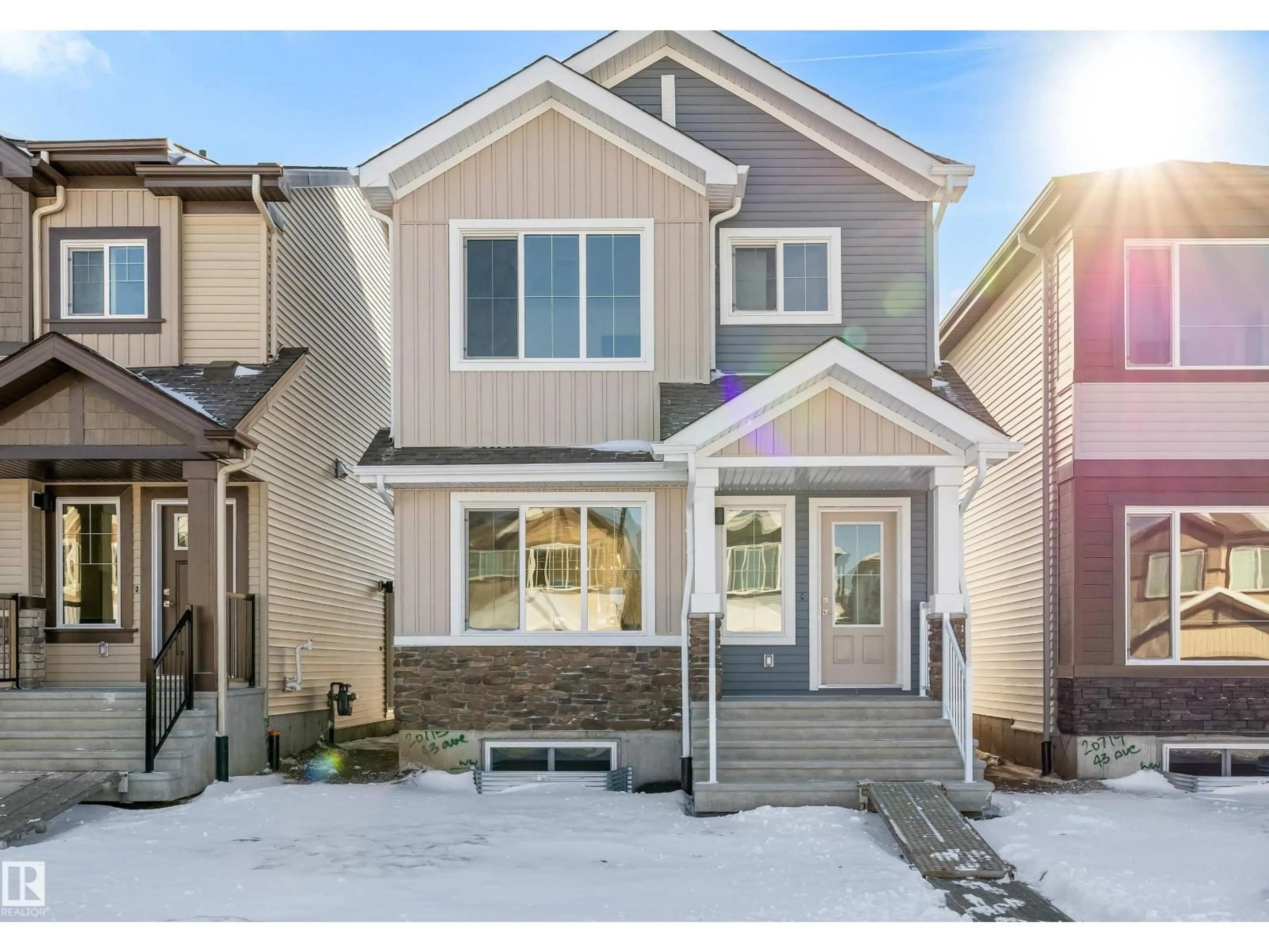 Home with vinyl exterior material, street for 20715 43 AV, Edmonton Alberta T6M3E9