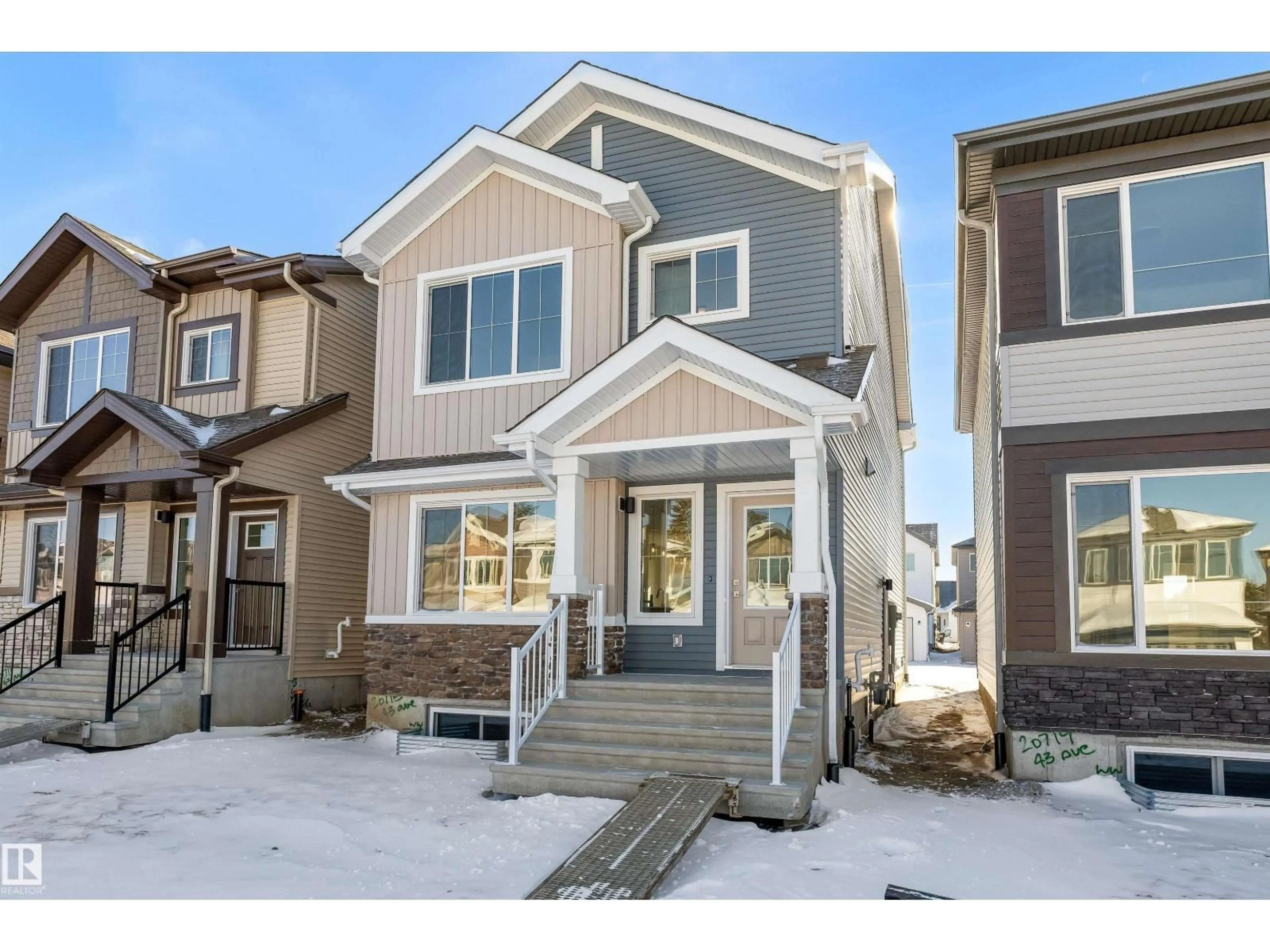 Home with vinyl exterior material, street for 20715 43 AV, Edmonton Alberta T6M3E9