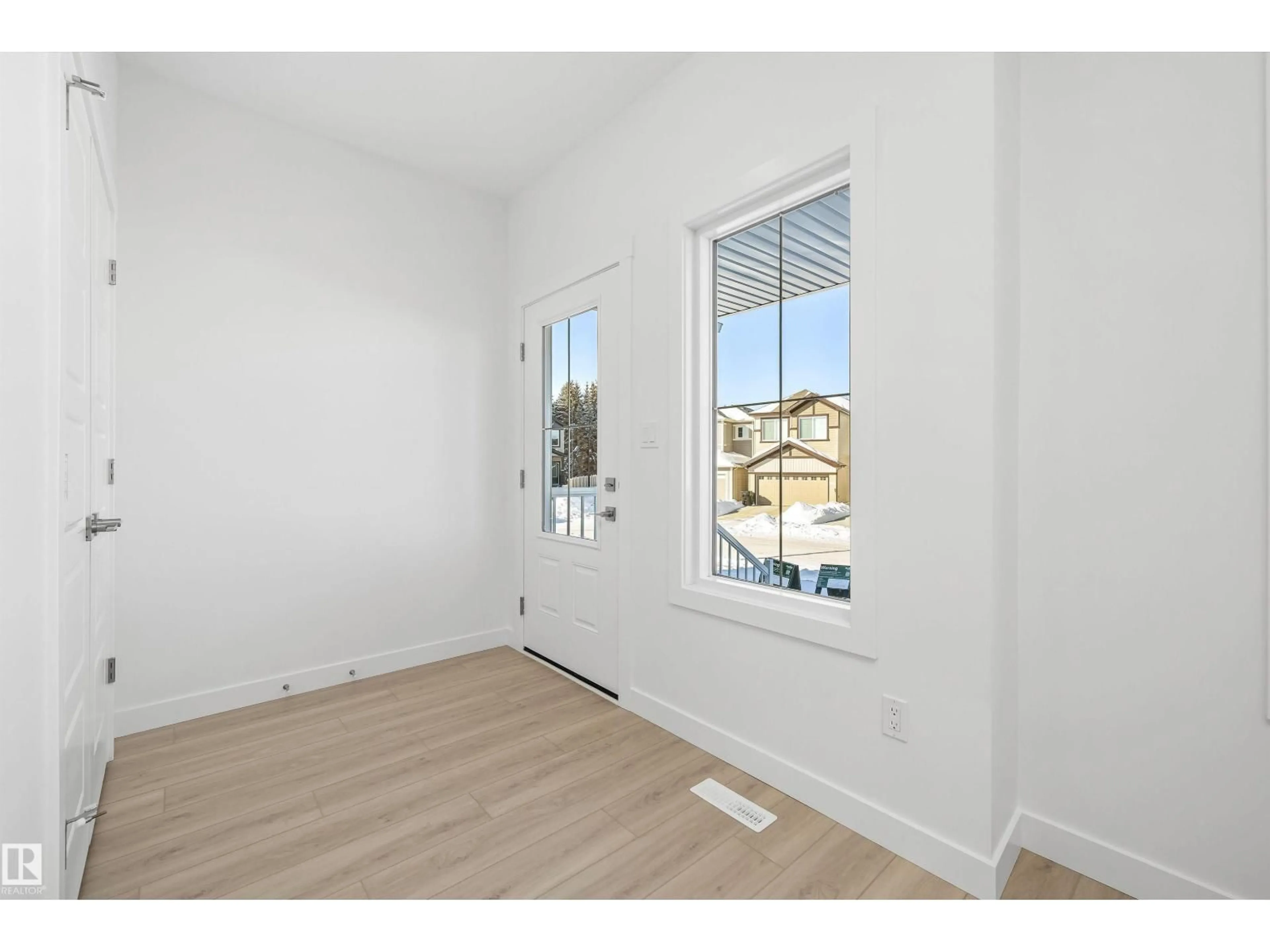 Indoor entryway for 20715 43 AV, Edmonton Alberta T6M3E9