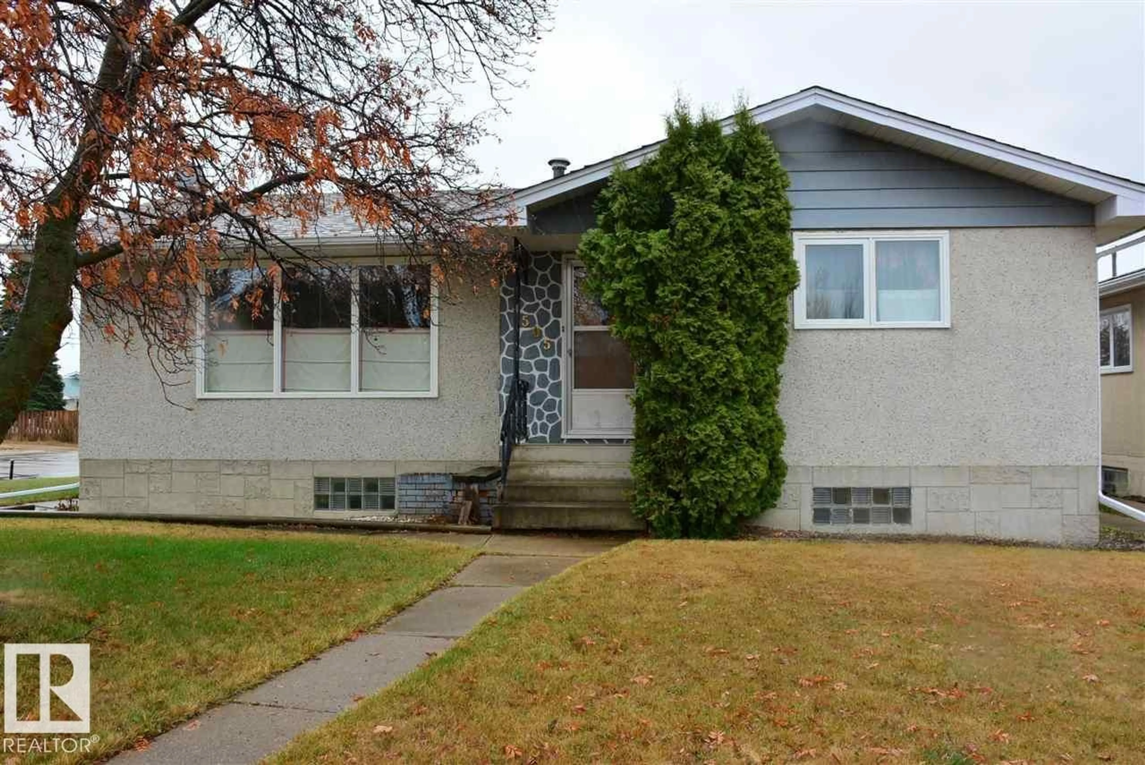 Home with vinyl exterior material, street for 4505 57 AVE, Barrhead Alberta T7N1K2