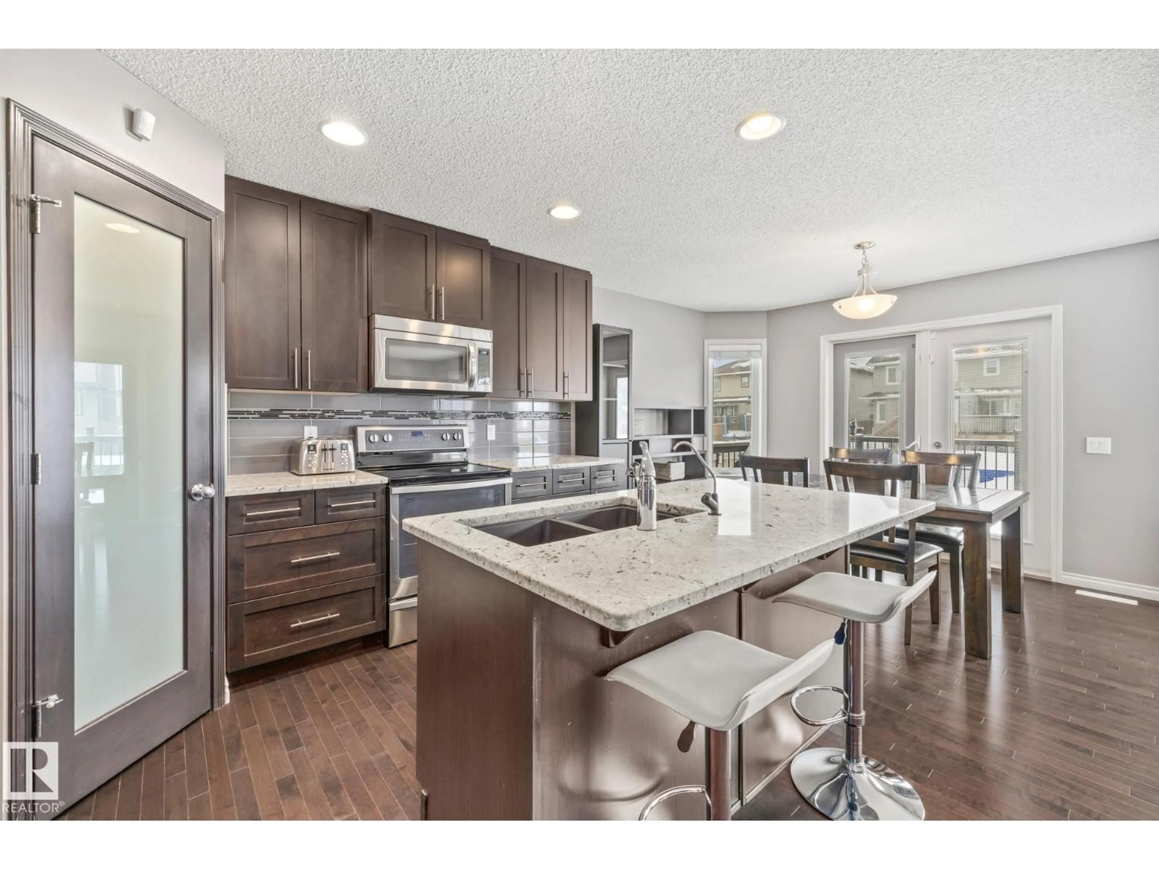 Open concept kitchen, unknown for 10616 97 ST, Morinville Alberta T8R0B8