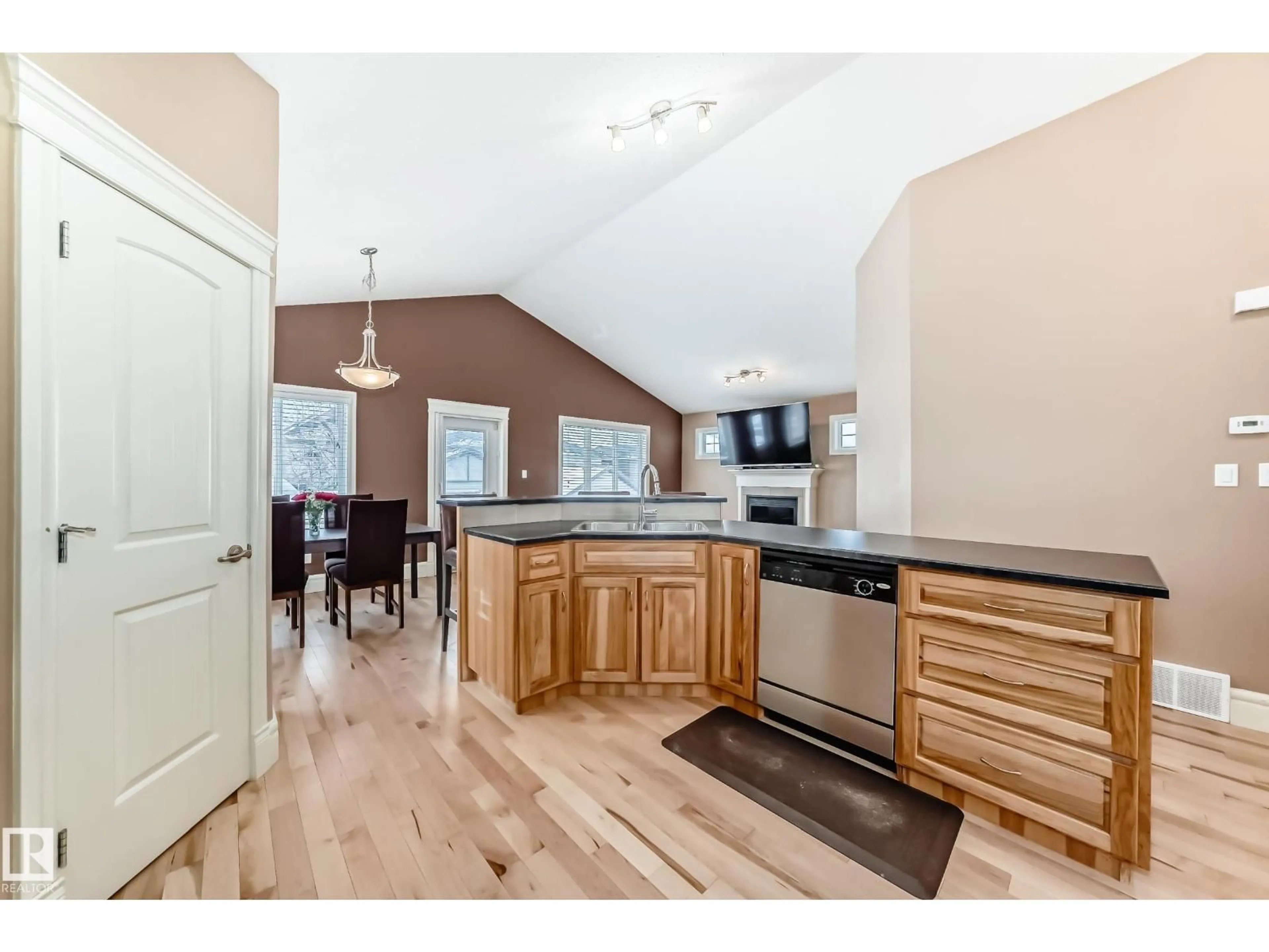 Open concept kitchen, wood/laminate floor for 7211 ESSEX WY, Sherwood Park Alberta T8H0L3