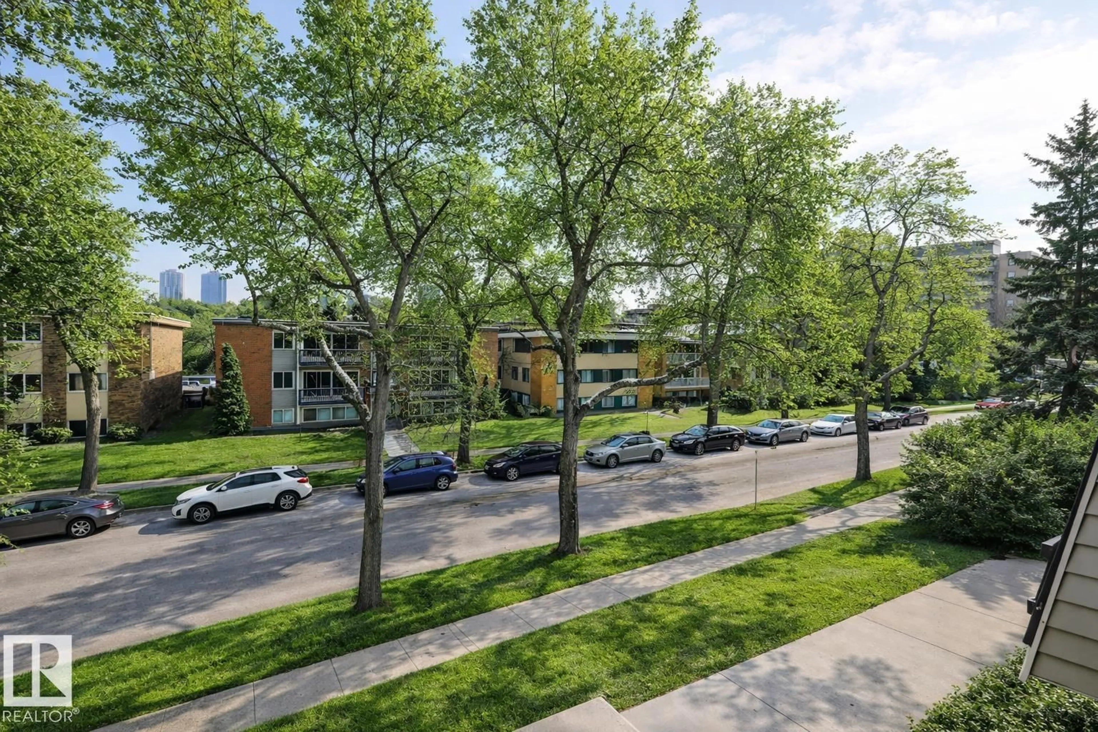 A pic from outside/outdoor area/front of a property/back of a property/a pic from drone, street for #302 - 10230 114 ST NW, Edmonton Alberta T5K1R9