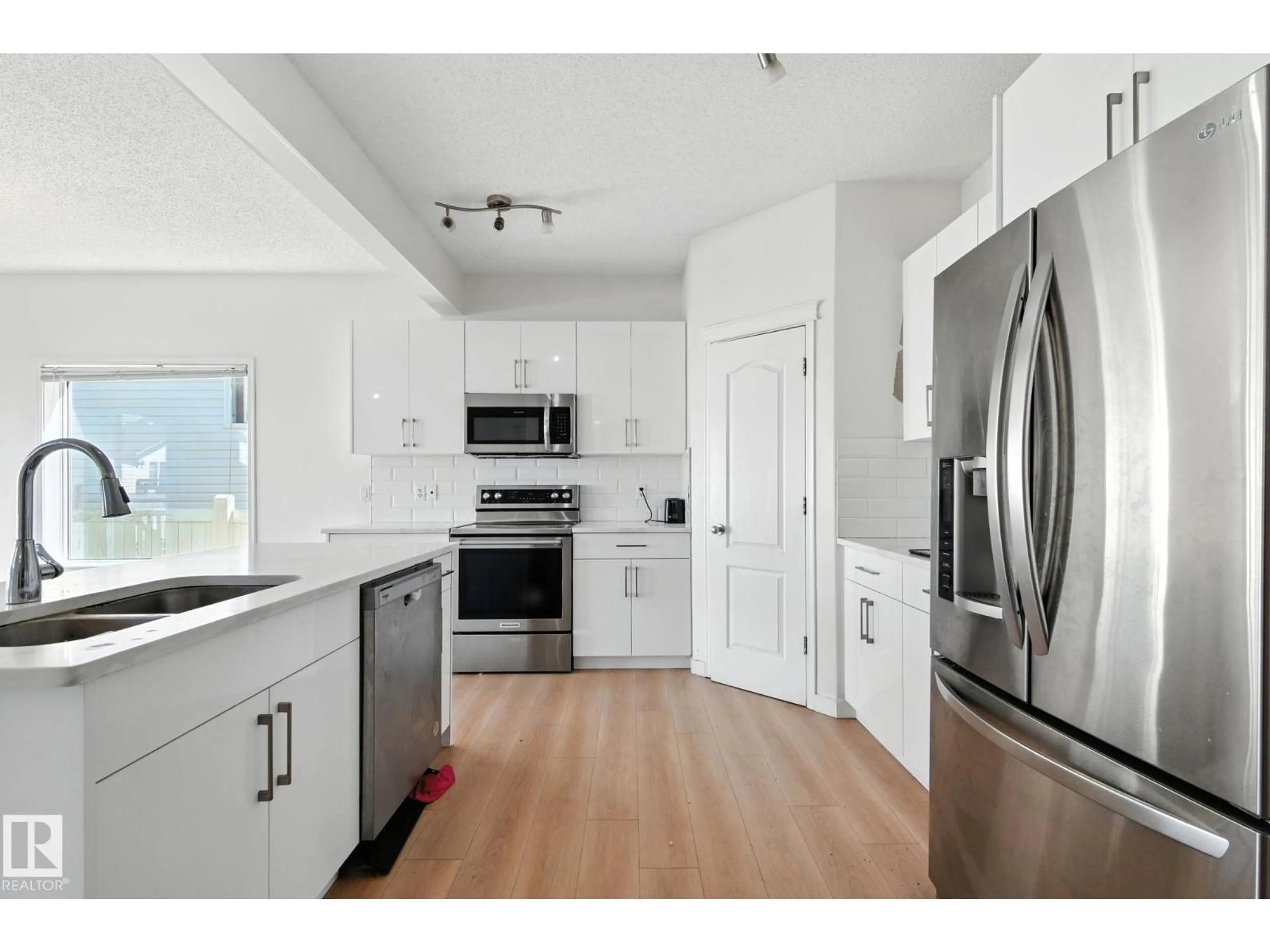 Open concept kitchen, unknown for SW - 7836 7 AV, Edmonton Alberta T6X1N3