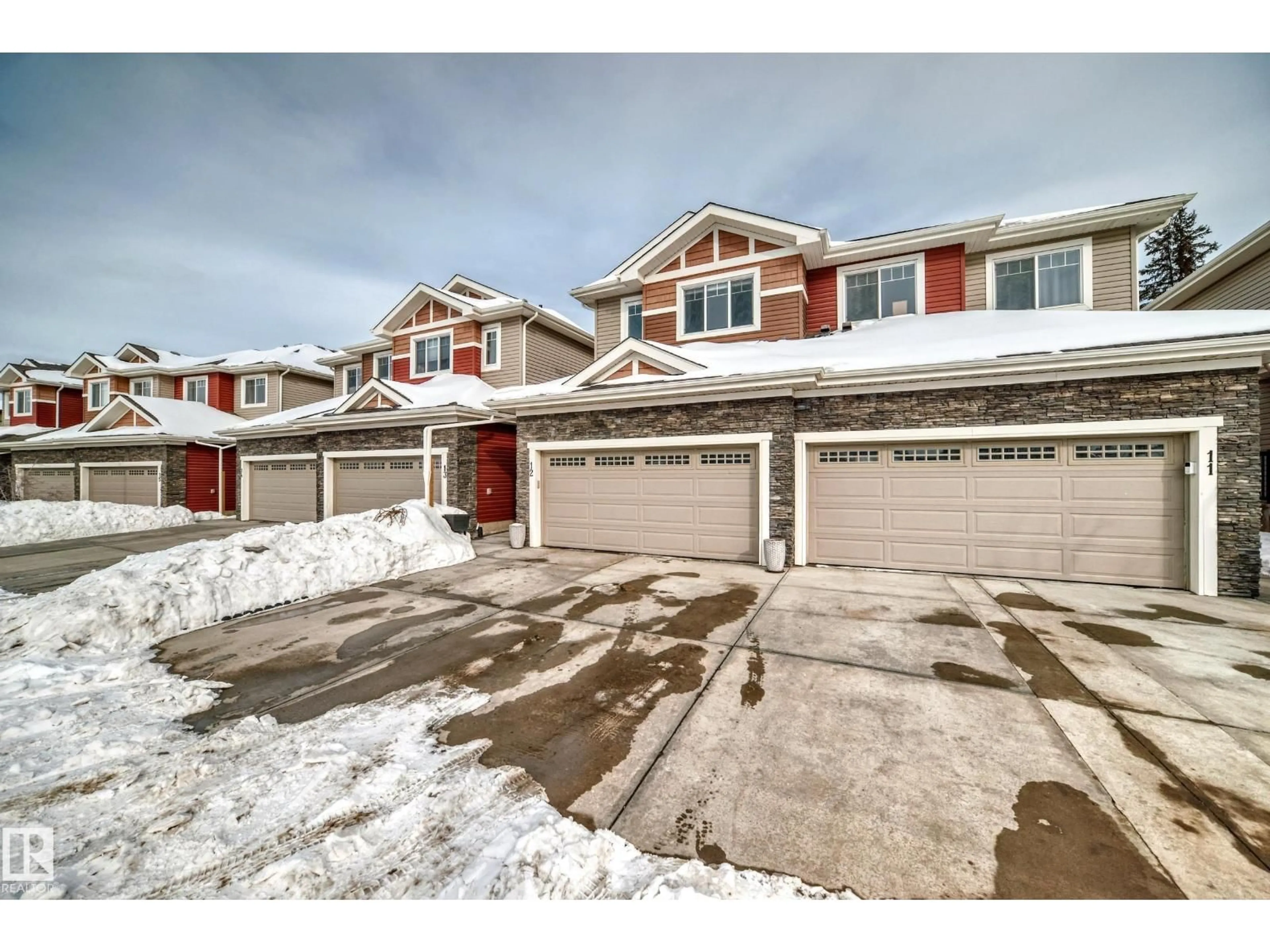 A pic from outside/outdoor area/front of a property/back of a property/a pic from drone, street for 94 - 12 LONGVIEW DR, Spruce Grove Alberta T7X0W3