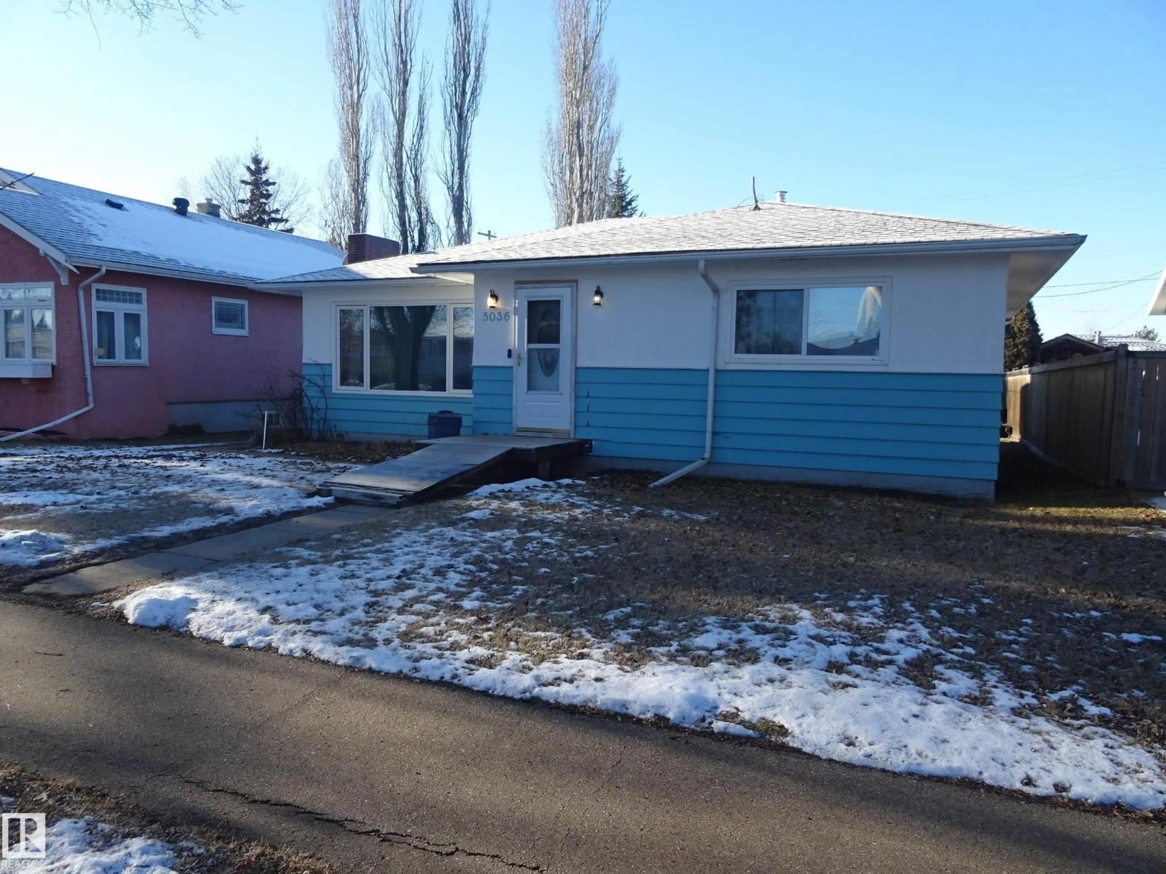 Home with vinyl exterior material, street for 5036 52 ST, Andrew Alberta T0B0C0