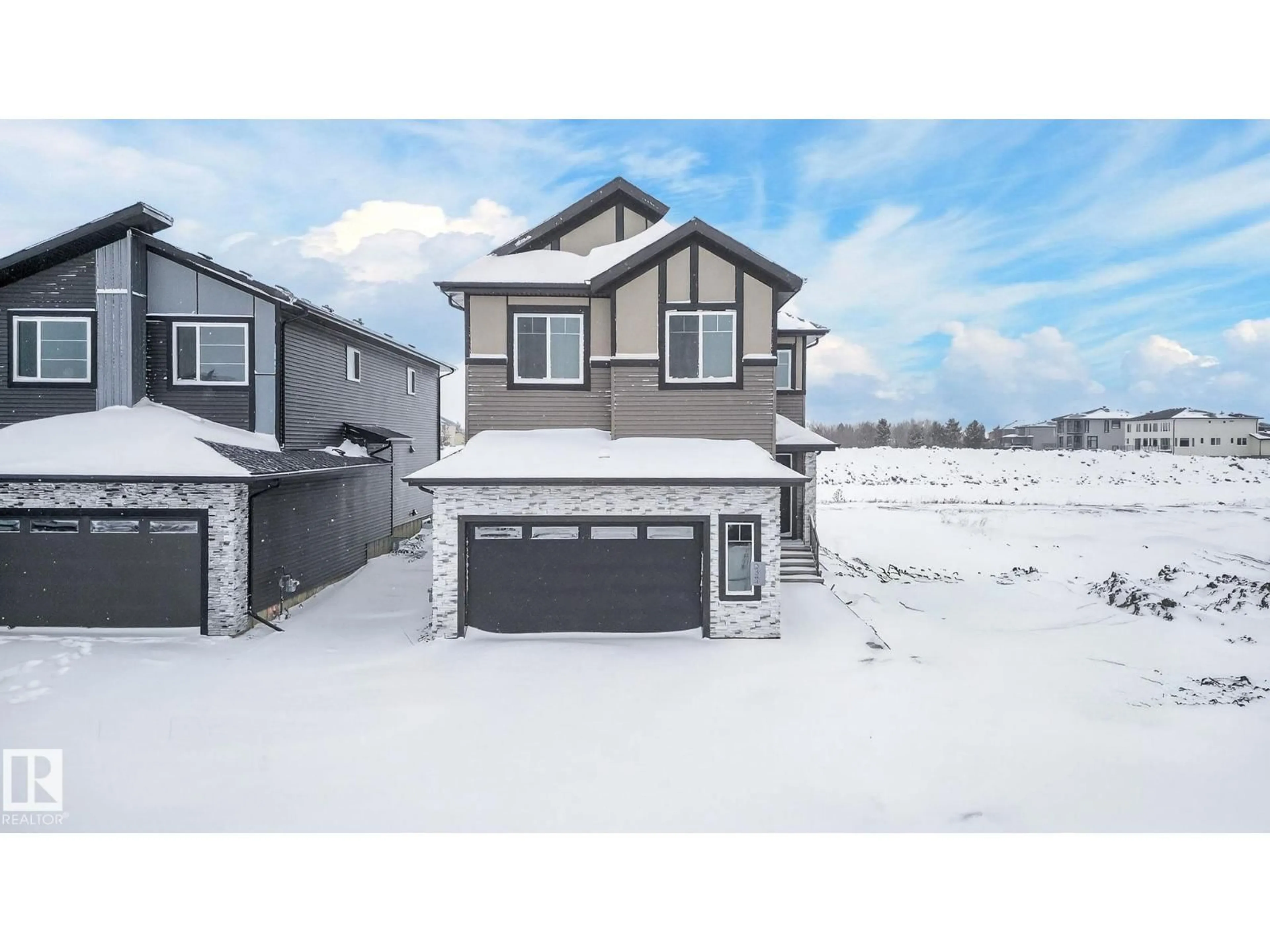 Home with vinyl exterior material, street for NE - 2322 63 AV, Rural Leduc County Alberta T4X3A6