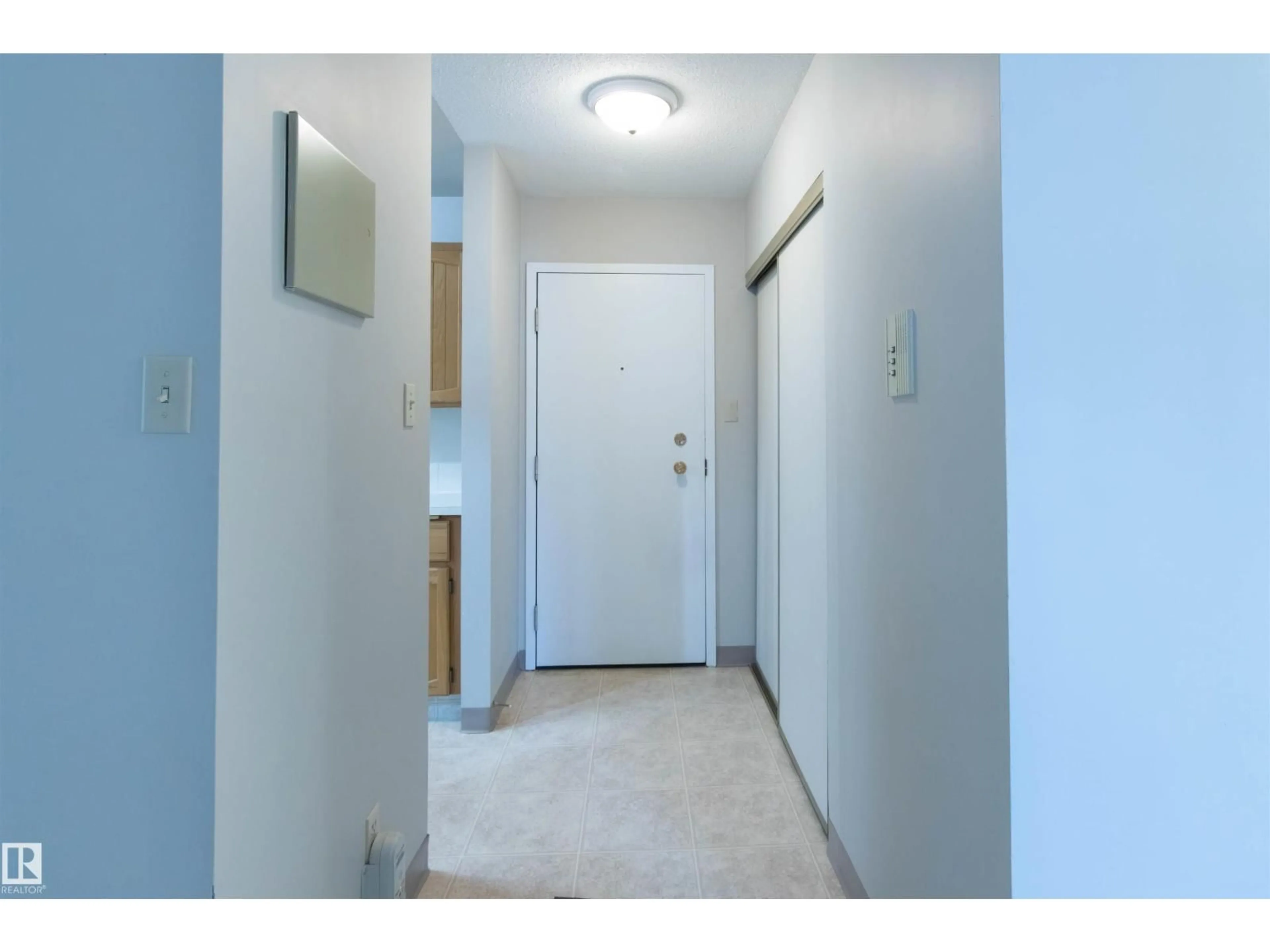 Indoor entryway for #210 - 3611 145 AV, Edmonton Alberta T5Y2L7