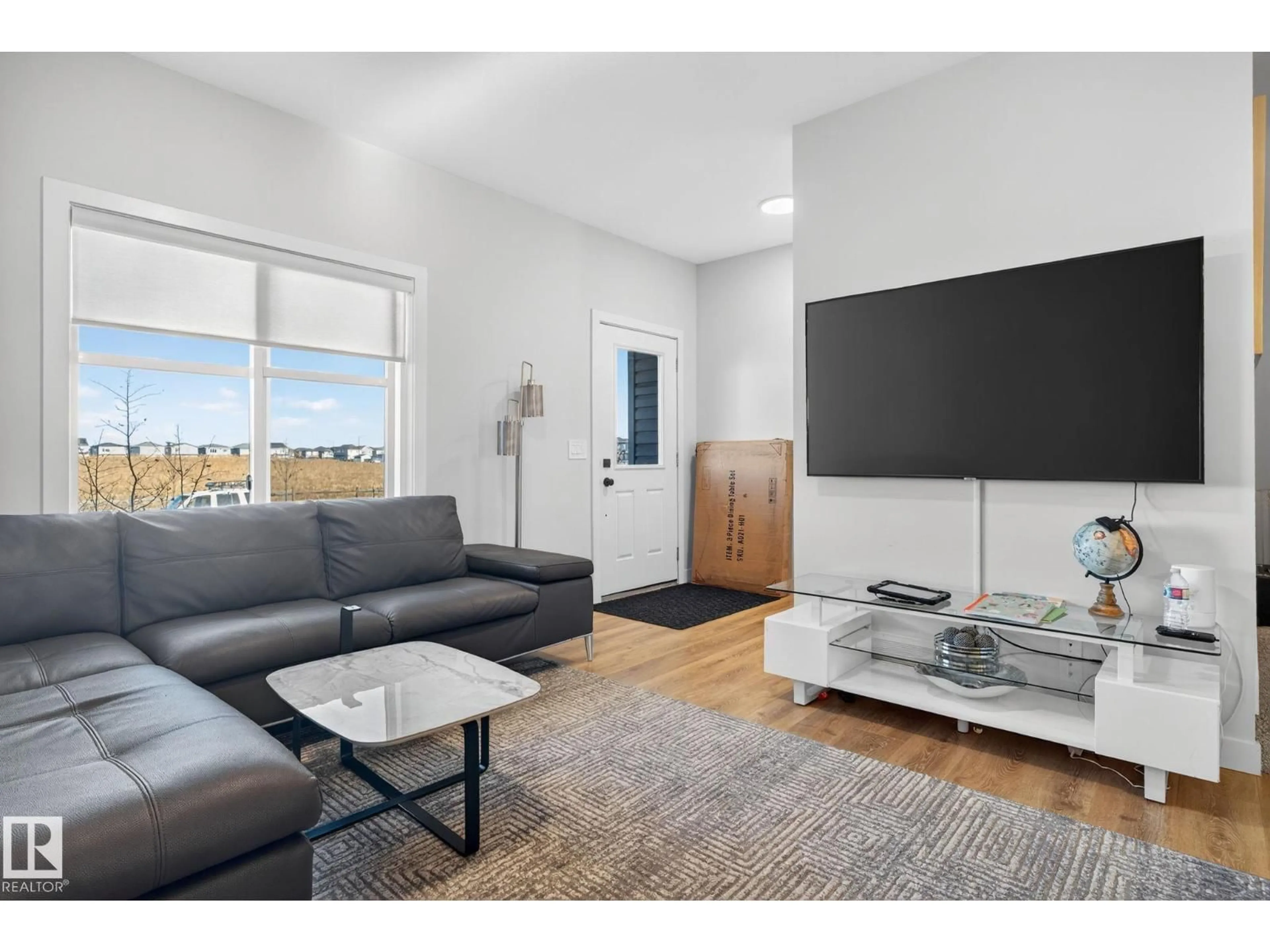 Living room with furniture, unknown for NW - 7135 178 AV, Edmonton Alberta T5Z0T8