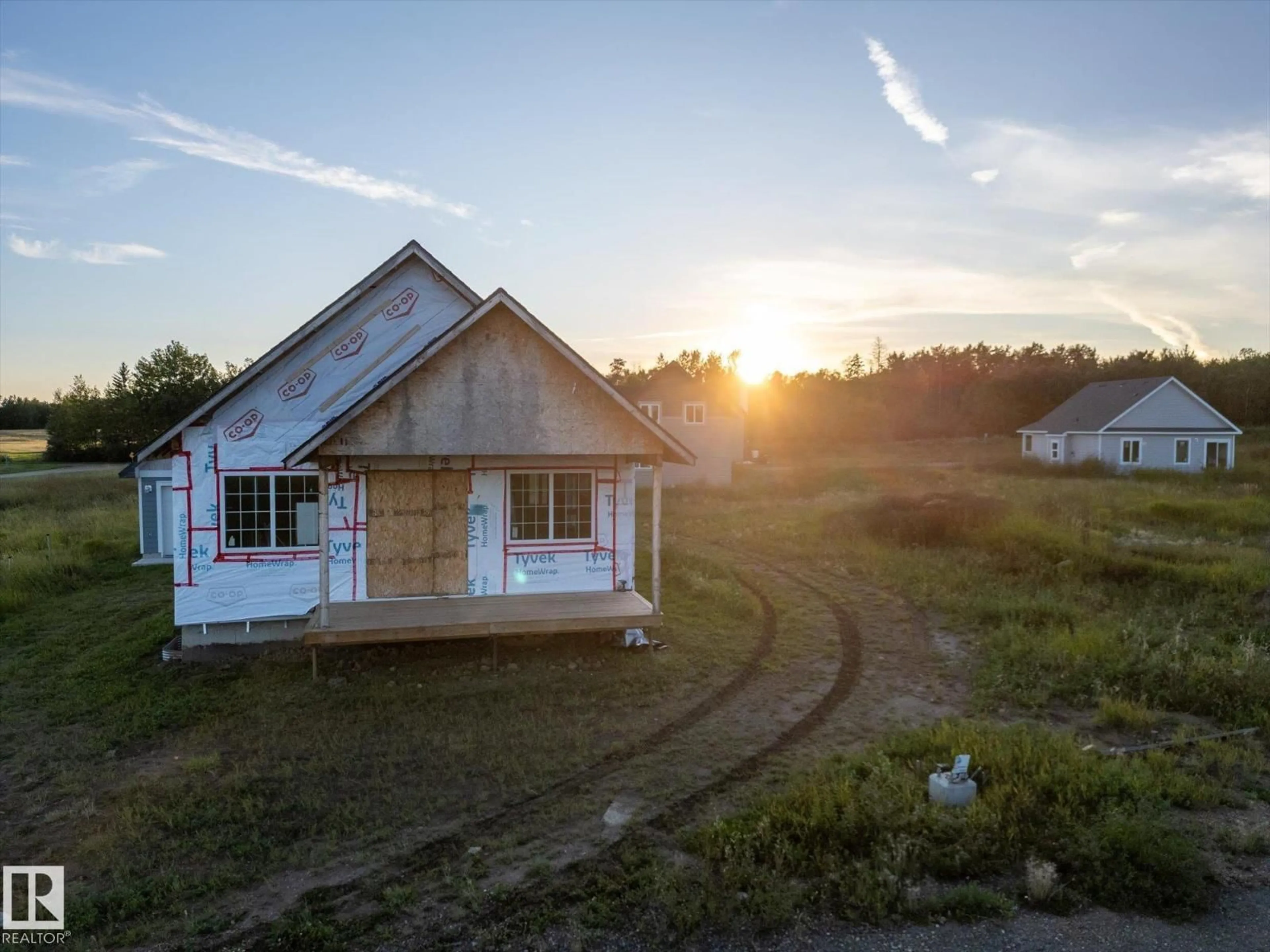 A pic from outside/outdoor area/front of a property/back of a property/a pic from drone, building for 49 - 5323 TOWNSHIP ROAD 541A, Rural Lac Ste. Anne County Alberta T0E1H0