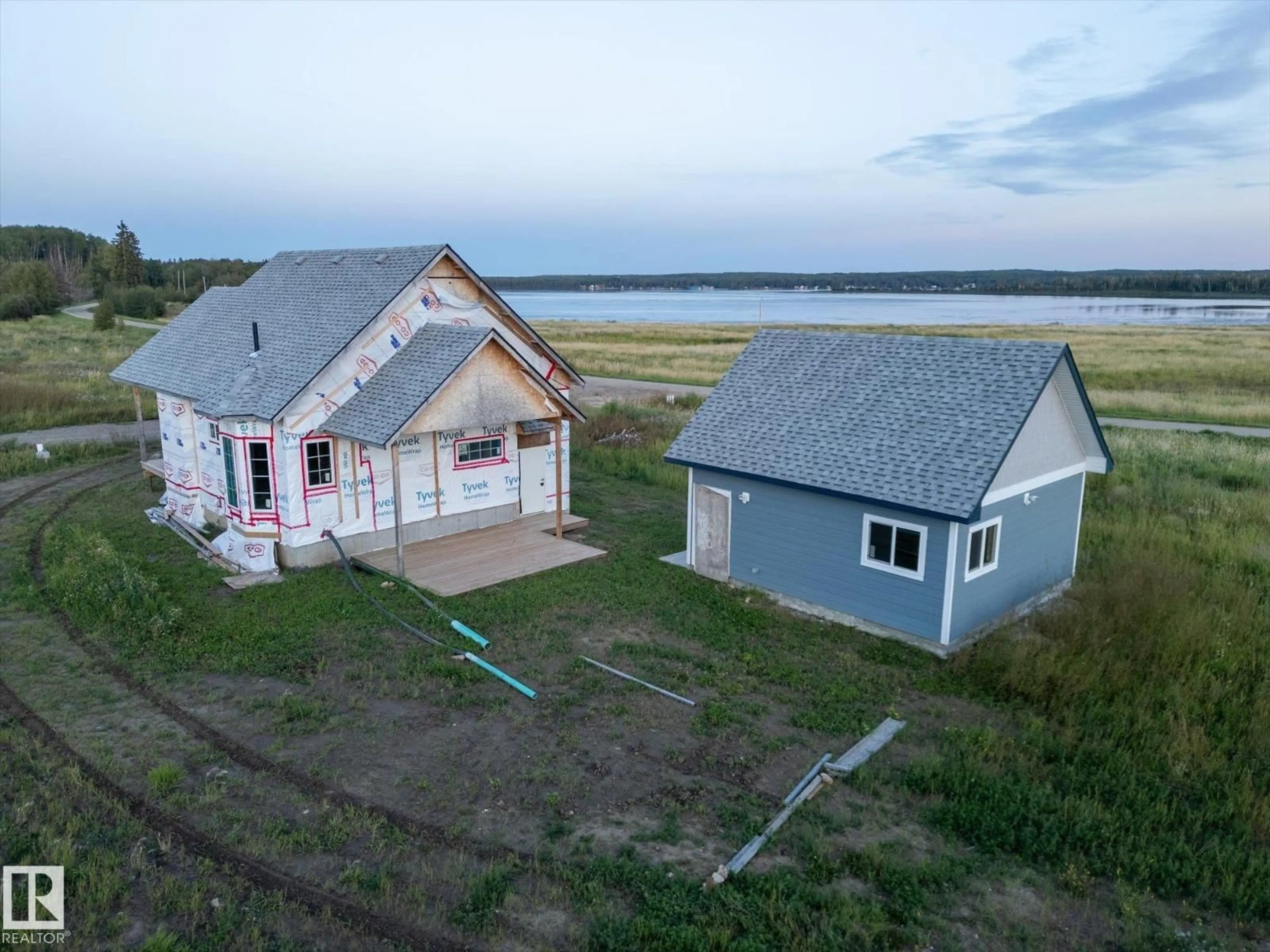 A pic from outside/outdoor area/front of a property/back of a property/a pic from drone, building for 49 - 5323 TOWNSHIP ROAD 541A, Rural Lac Ste. Anne County Alberta T0E1H0