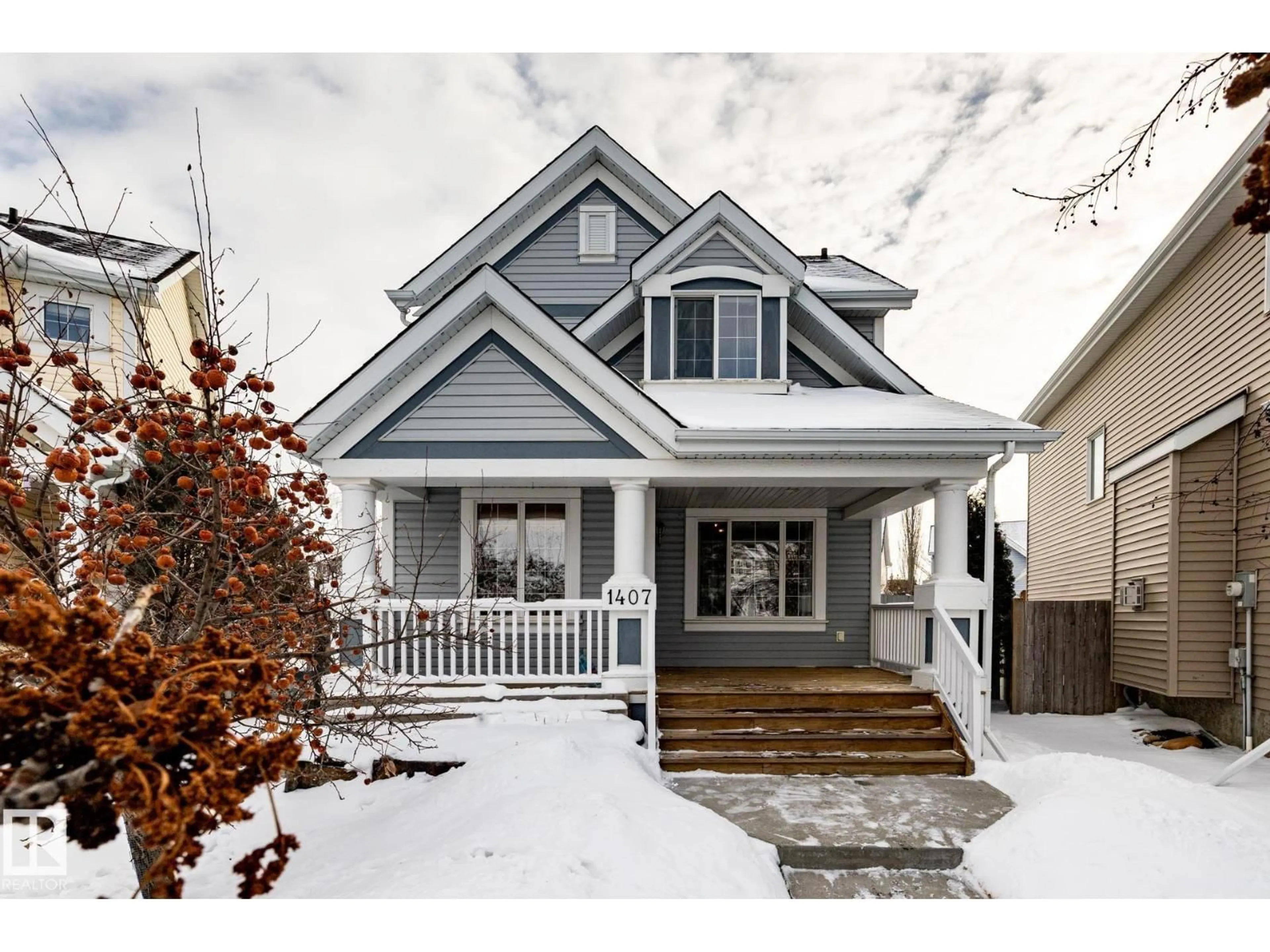 Home with vinyl exterior material, street for 1407 72 ST, Edmonton Alberta T6X0E2