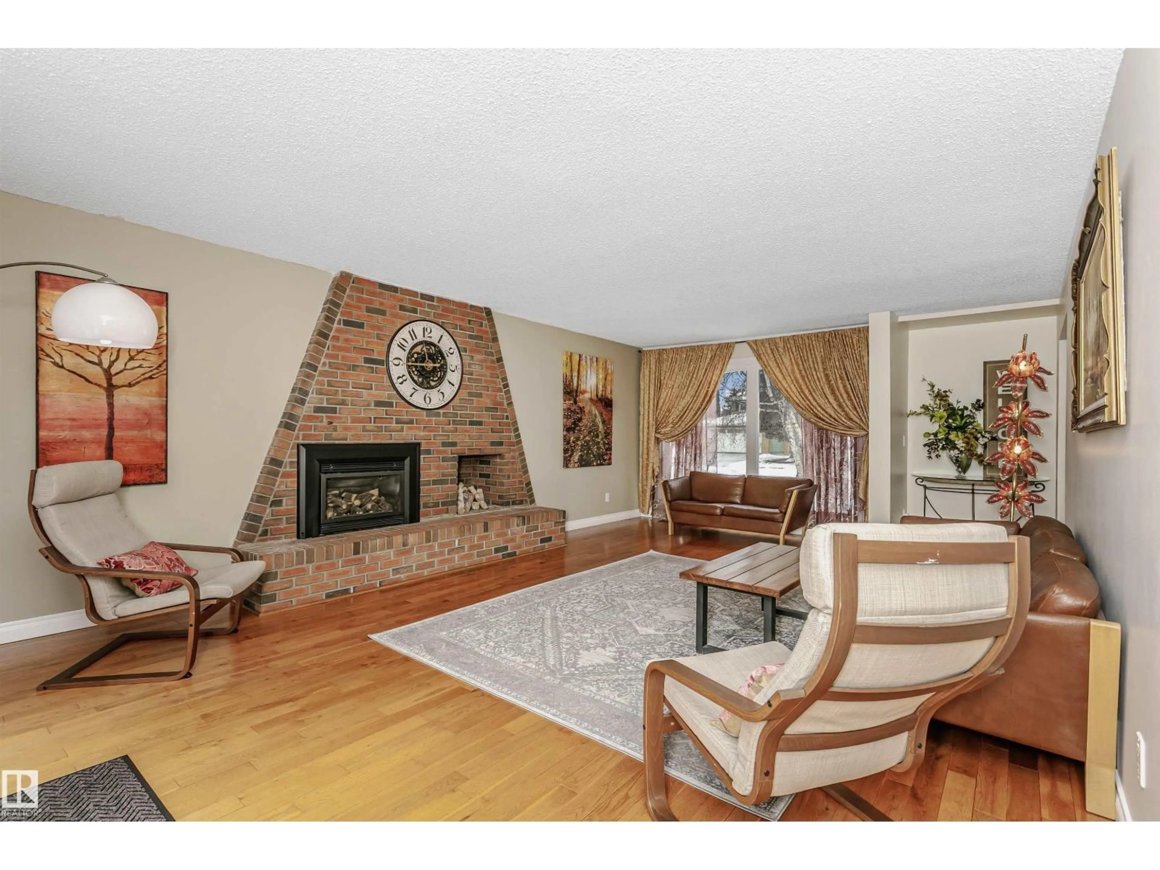 Living room with furniture, unknown for 18507 92 AV, Edmonton Alberta T5T1P2