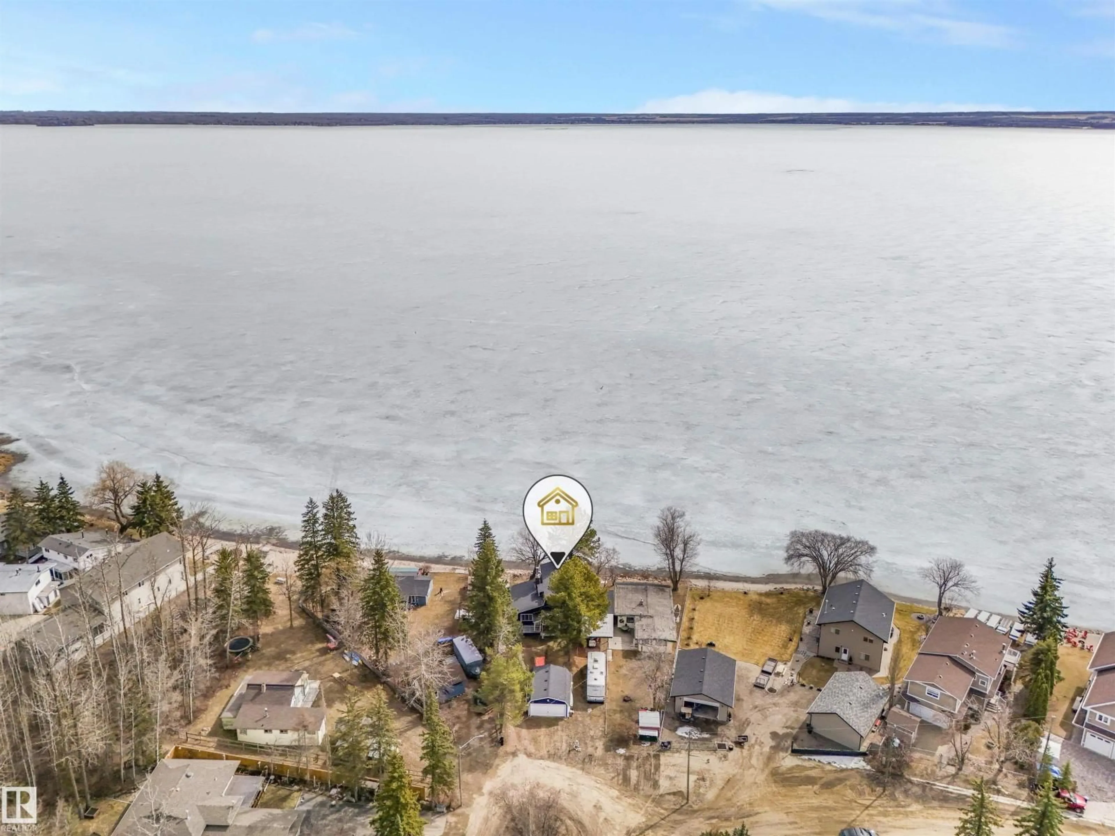 A pic from outside/outdoor area/front of a property/back of a property/a pic from drone, water/lake/river/ocean view for 809 8 ST, Rural Lac Ste. Anne County Alberta T0E1A0