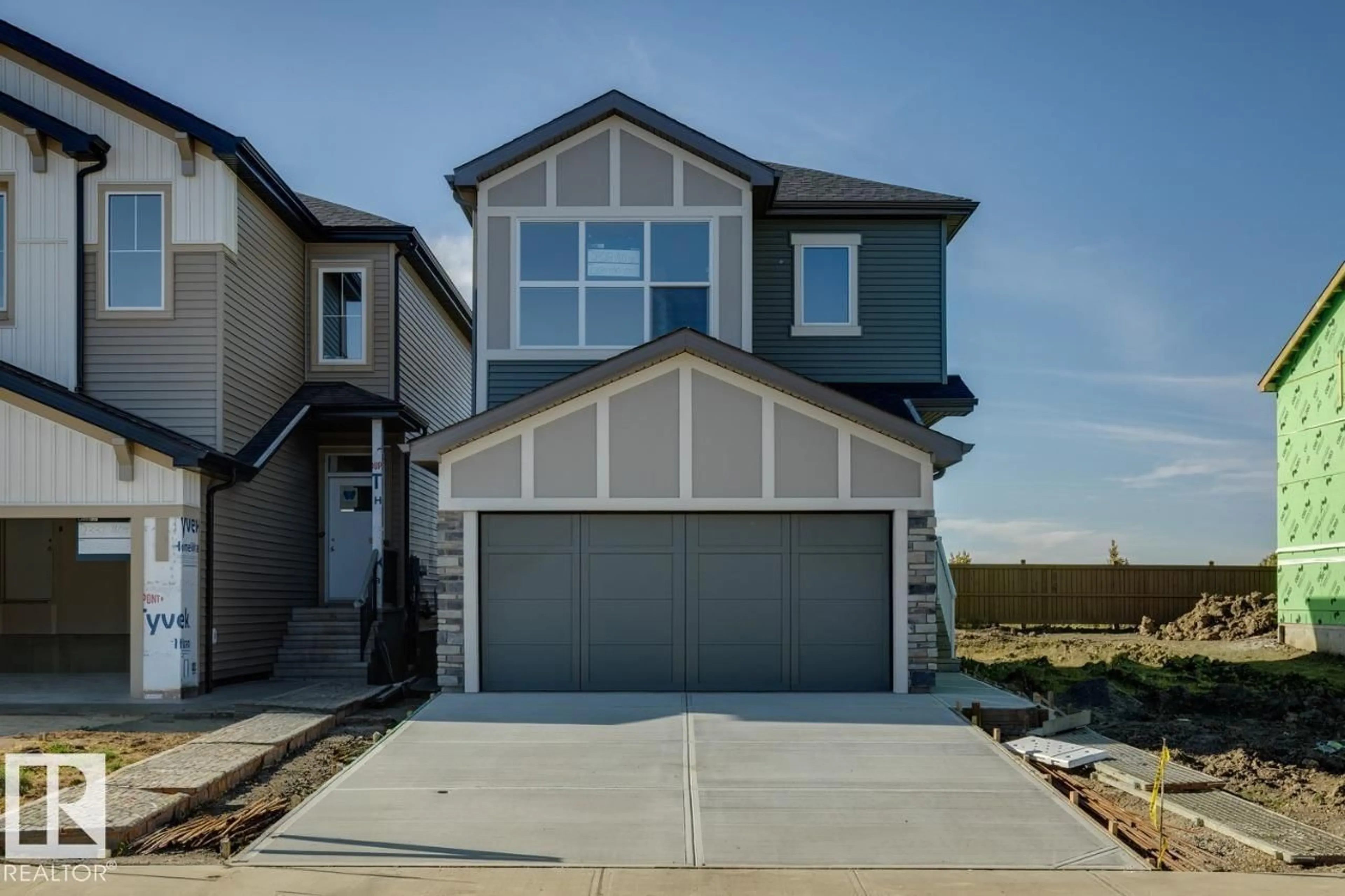 Home with vinyl exterior material, street for SW - 2328 160 ST, Edmonton Alberta T6W4E5