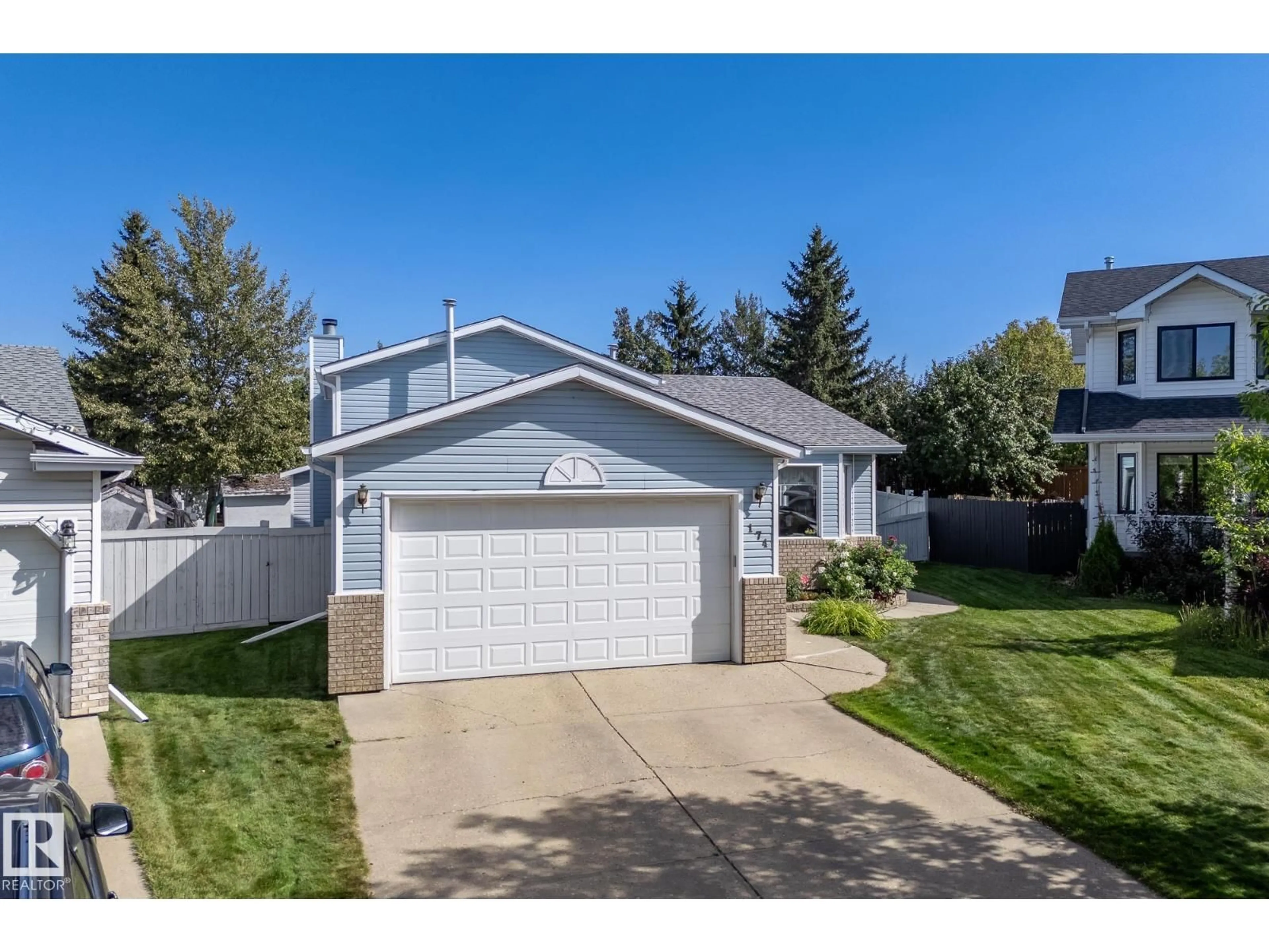 Home with vinyl exterior material, street for 174 REGENCY DR, Sherwood Park Alberta T8A5R8