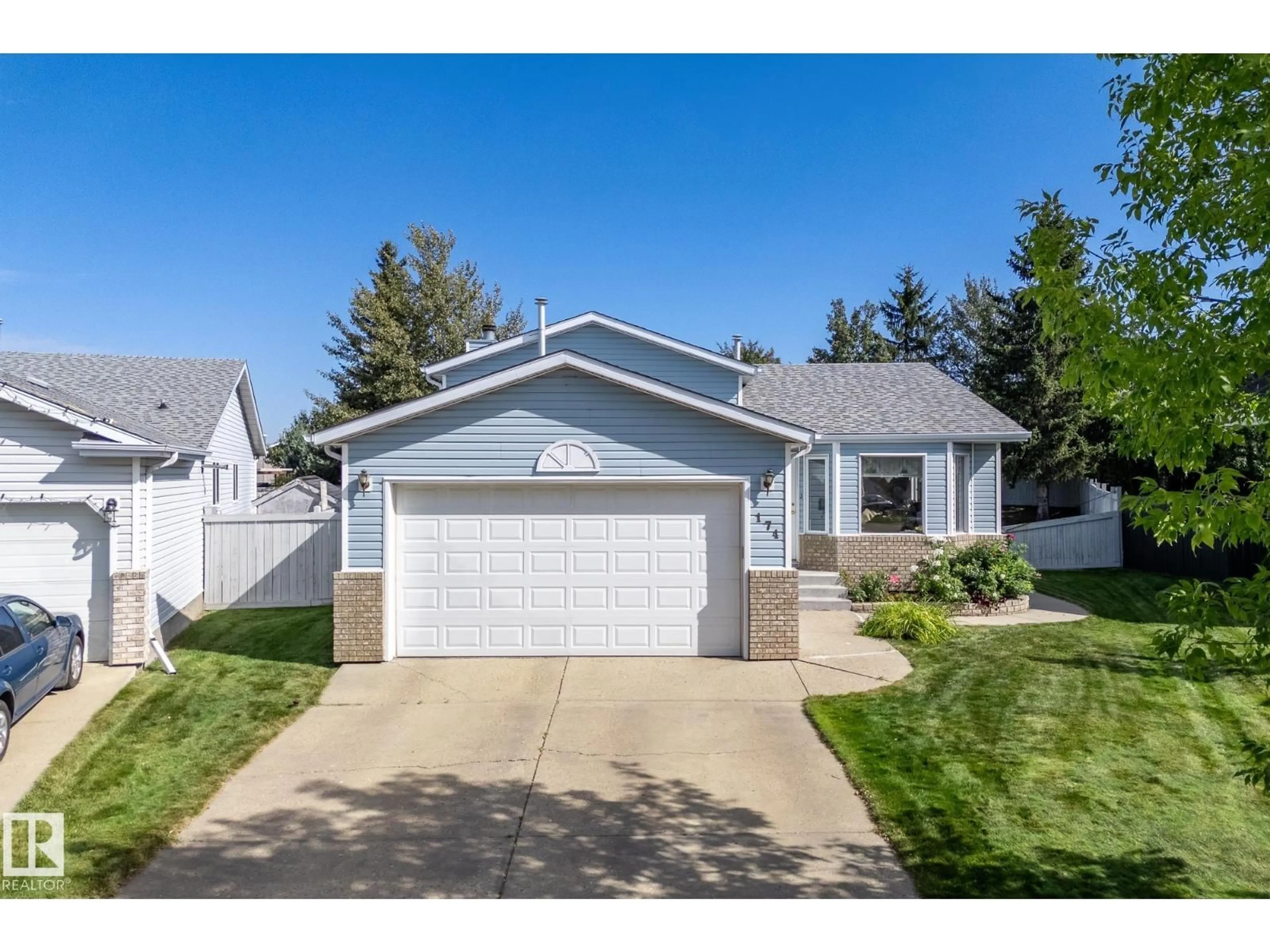 Home with vinyl exterior material, street for 174 REGENCY DR, Sherwood Park Alberta T8A5R8