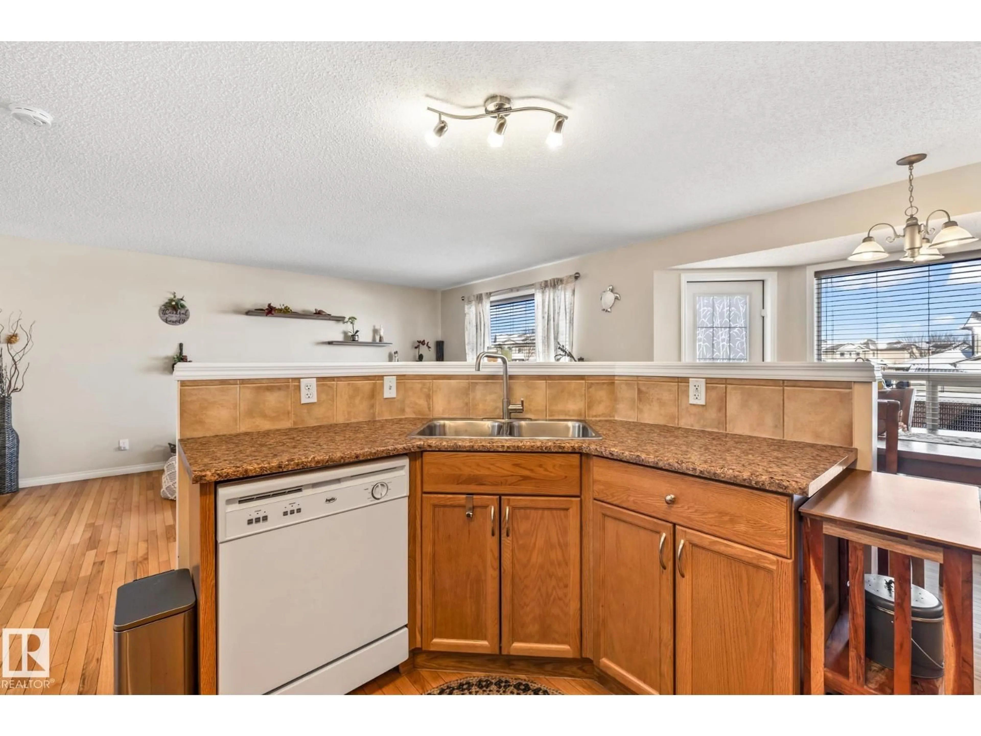Open concept kitchen, unknown for NW - 5468 162B AV, Edmonton Alberta T5Y0E8