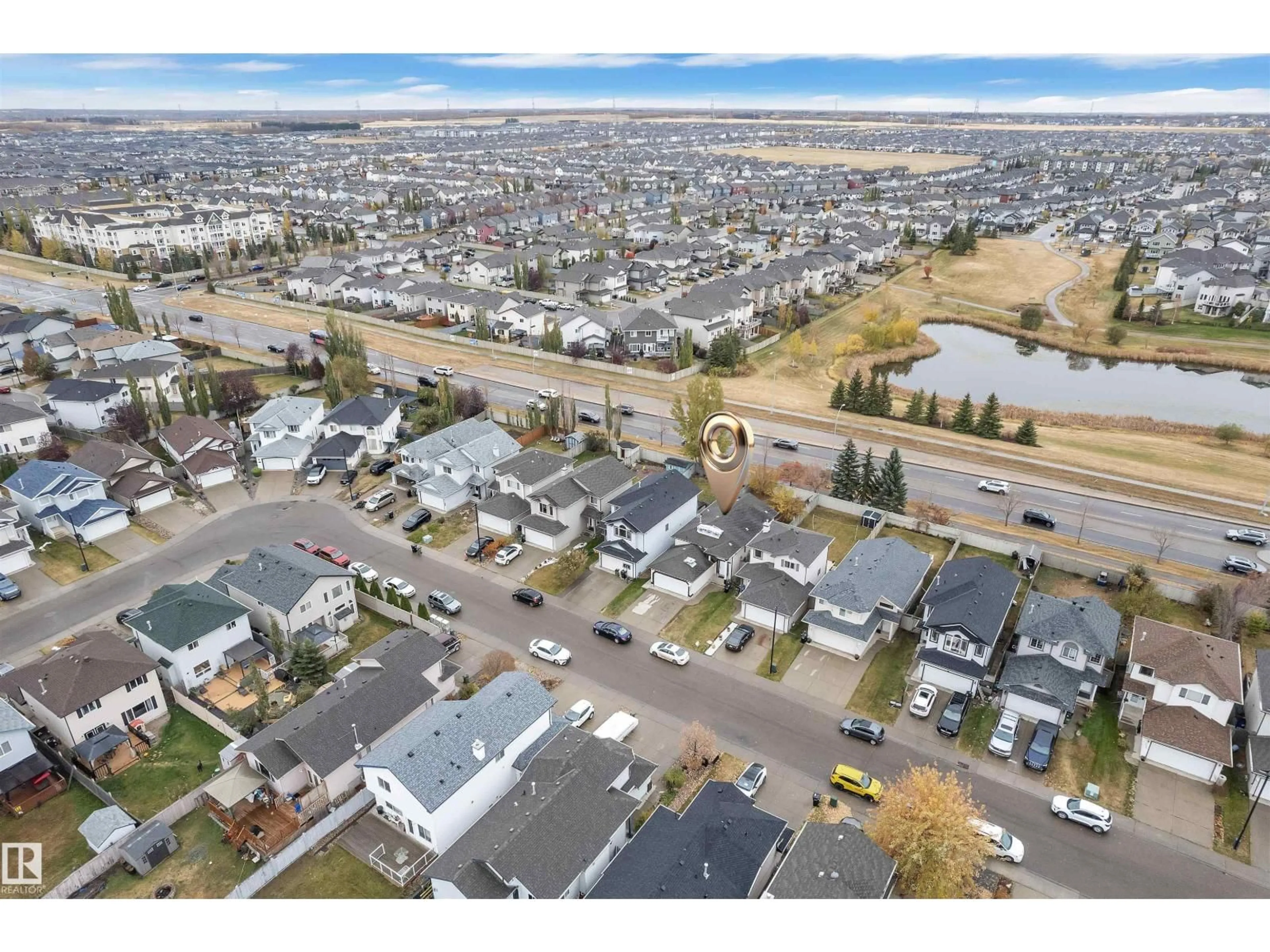 A pic from outside/outdoor area/front of a property/back of a property/a pic from drone, street for 3307 24 AV, Edmonton Alberta T6T1Y6