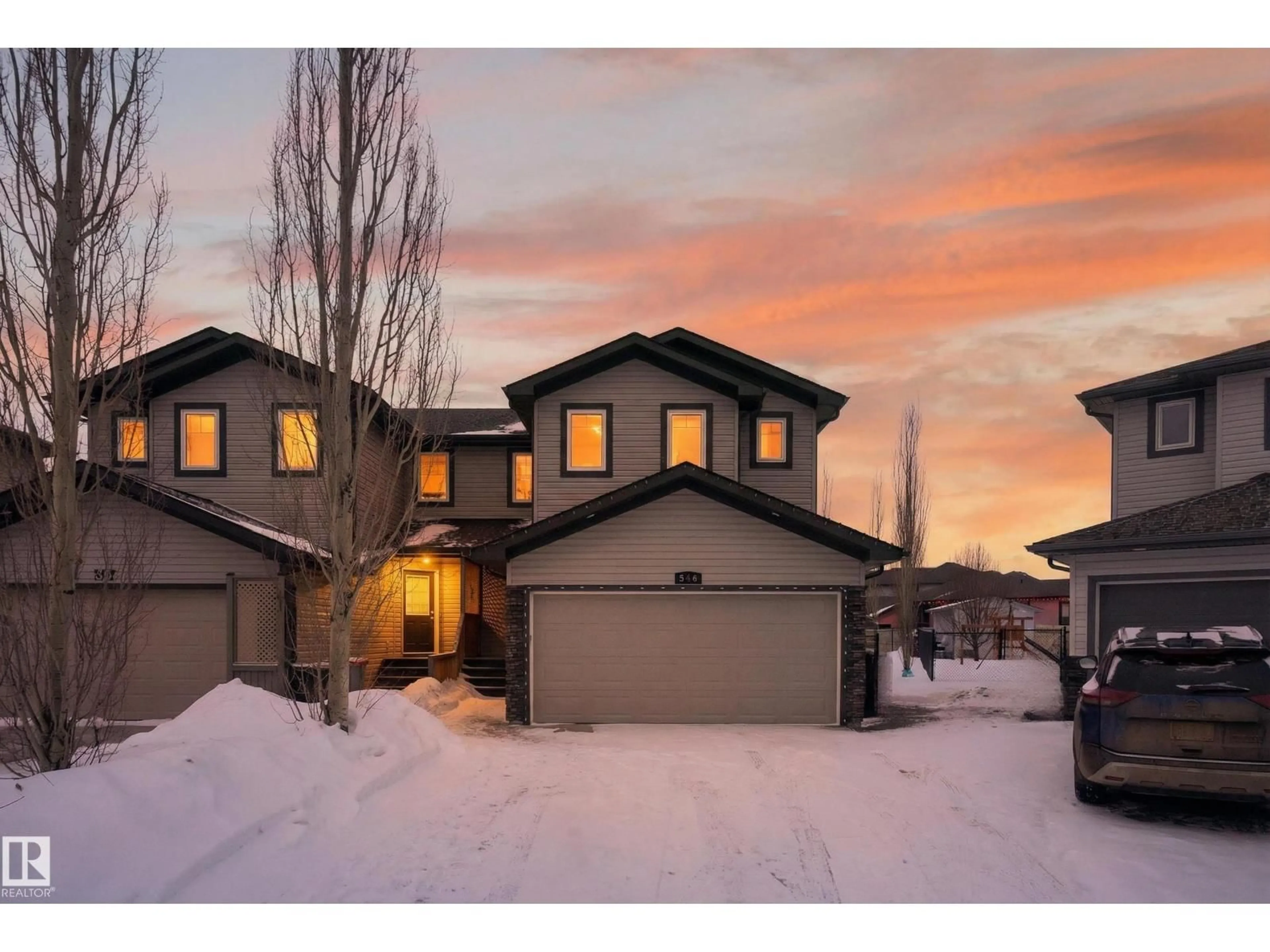 A pic from outside/outdoor area/front of a property/back of a property/a pic from drone, street for 506 FAIRWAY TC, Stony Plain Alberta T7Z0G9