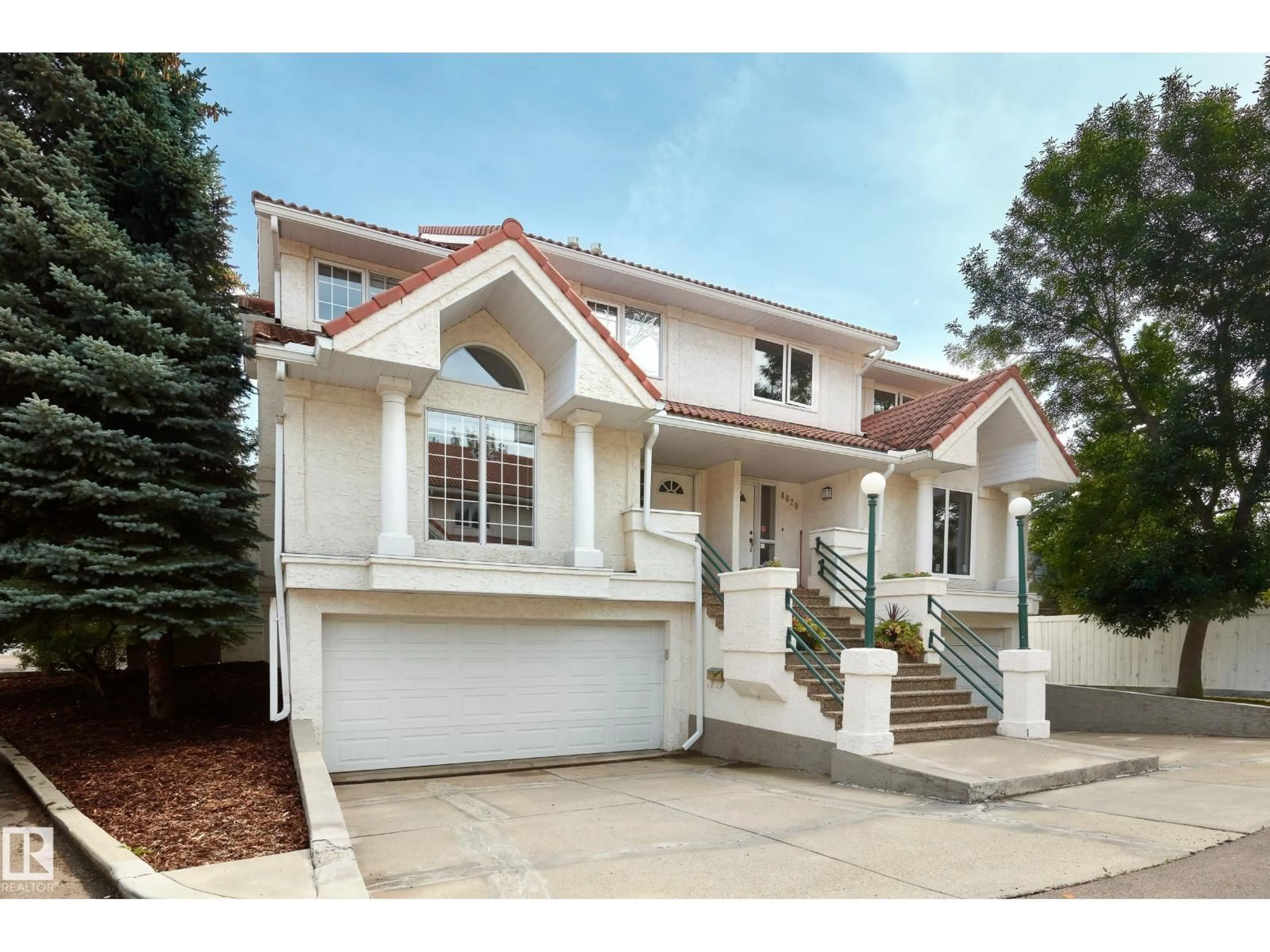 Home with vinyl exterior material, street for NW - 4618 151 ST, Edmonton Alberta T6H5N8