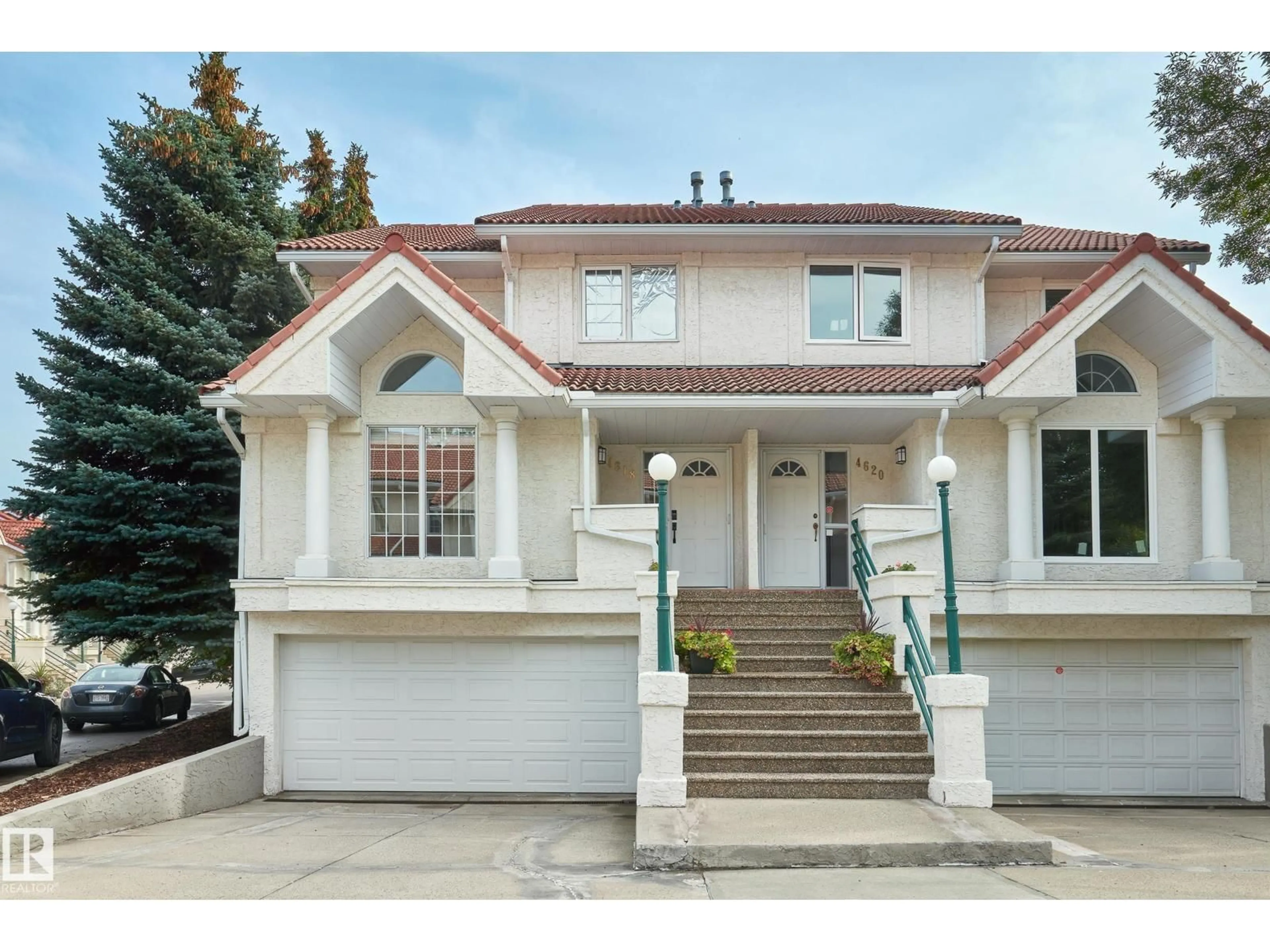 Home with vinyl exterior material, street for NW - 4618 151 ST, Edmonton Alberta T6H5N8