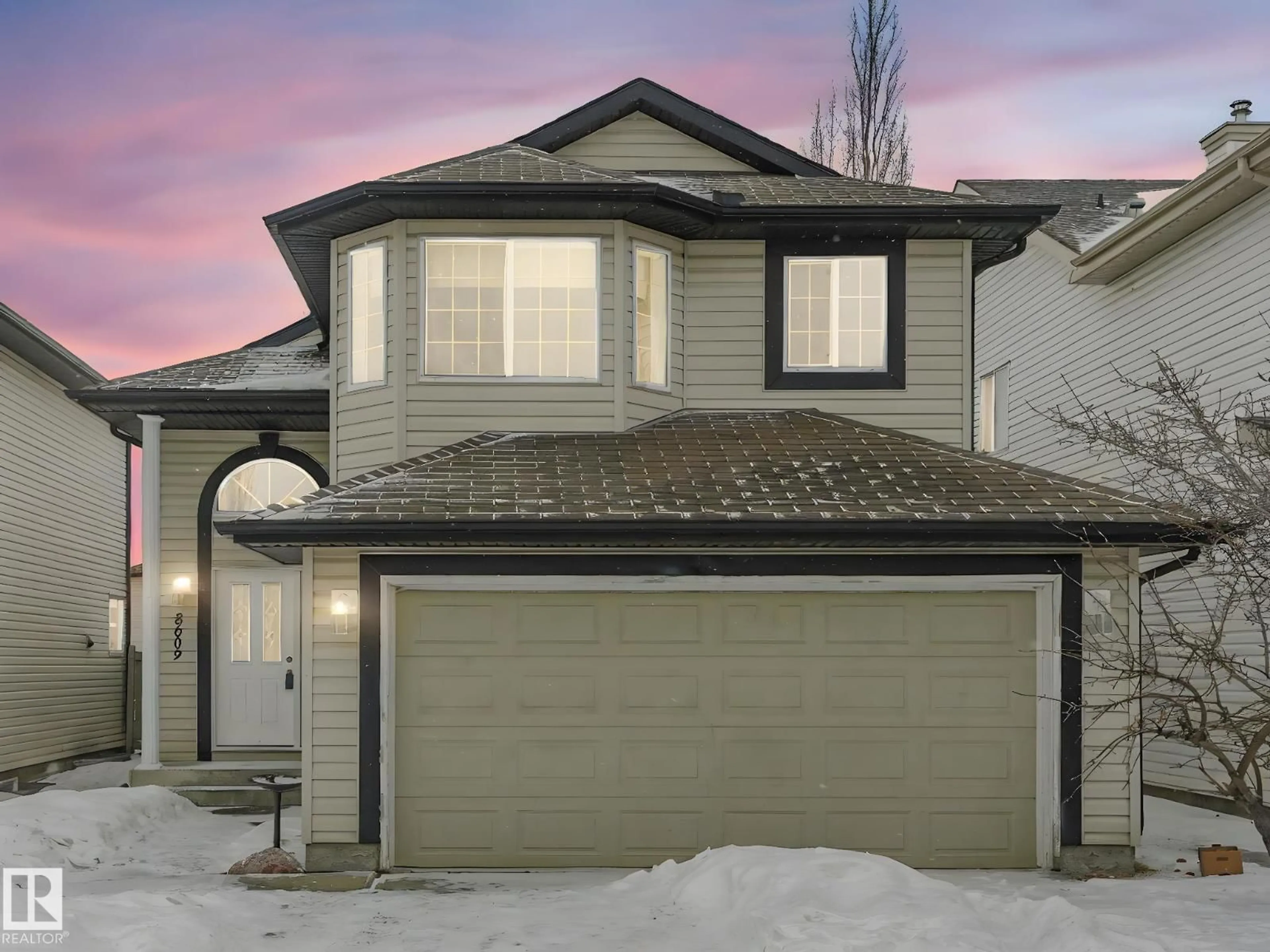 Home with vinyl exterior material, street for SW - 8609 6 AV, Edmonton Alberta T6X1G4