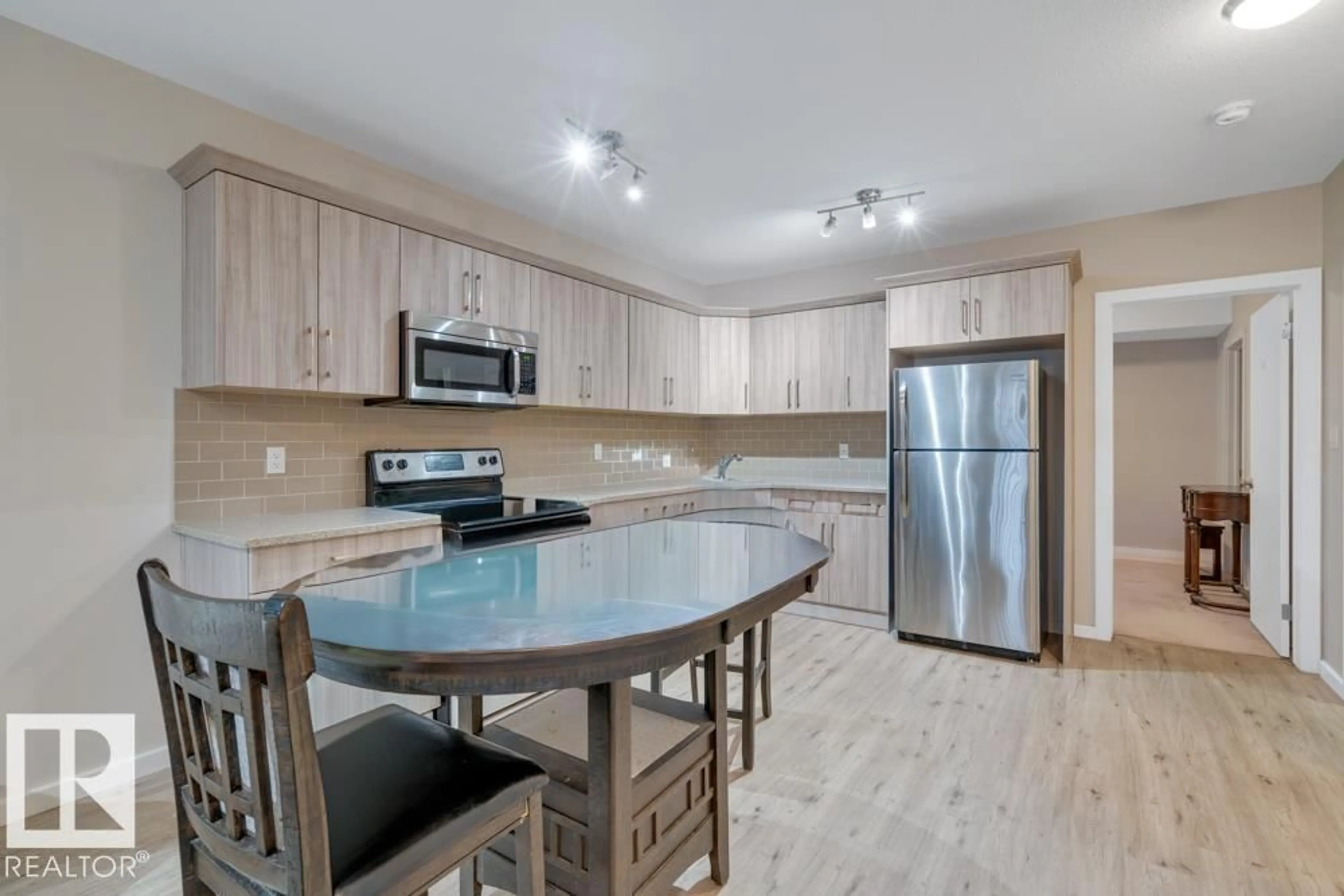 Open concept kitchen, unknown for NW - 11840B 122 ST, Edmonton Alberta T5L0C2