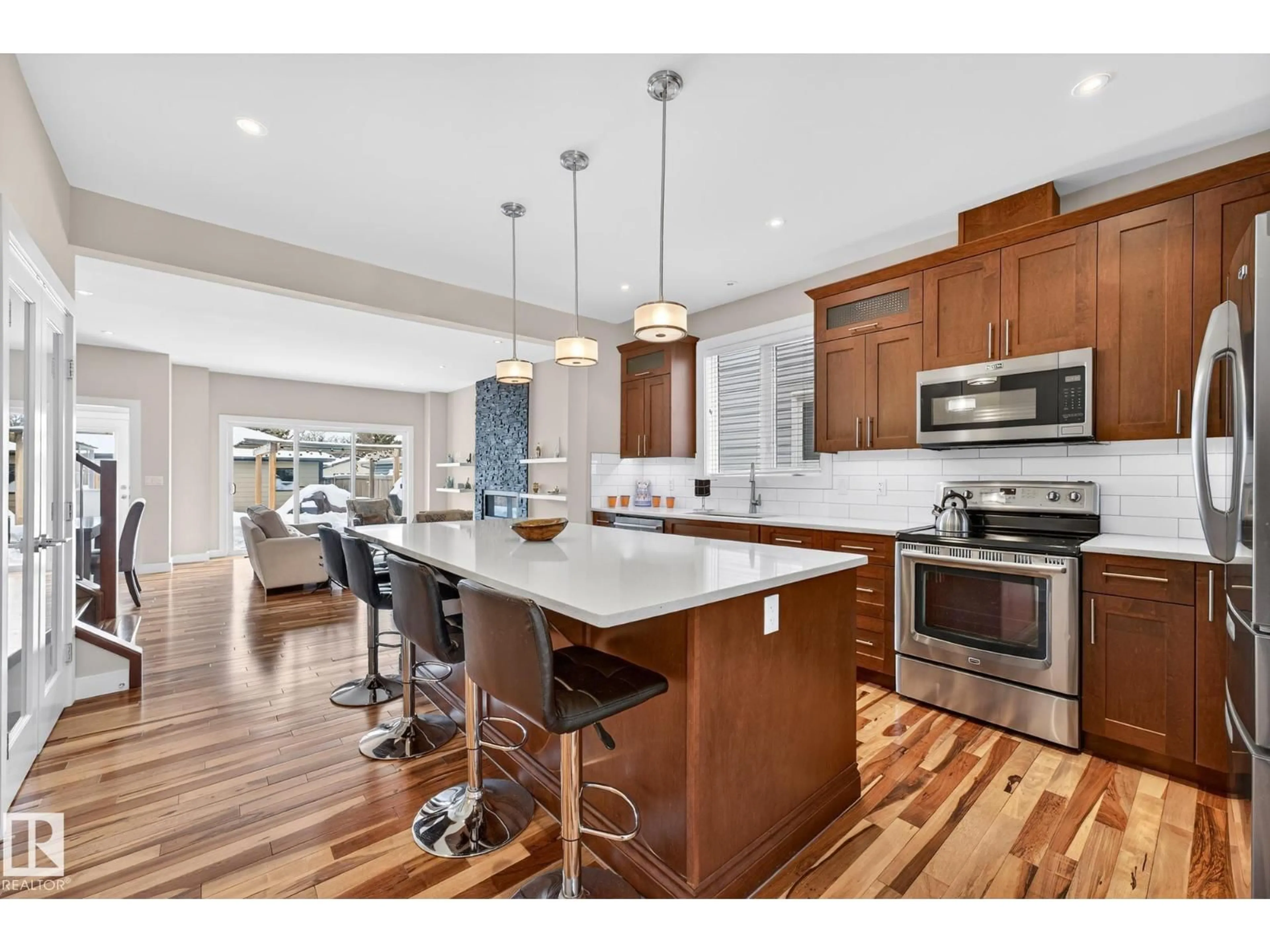 Open concept kitchen, wood/laminate floor for NW - 10283 89 ST, Edmonton Alberta T5H1R3