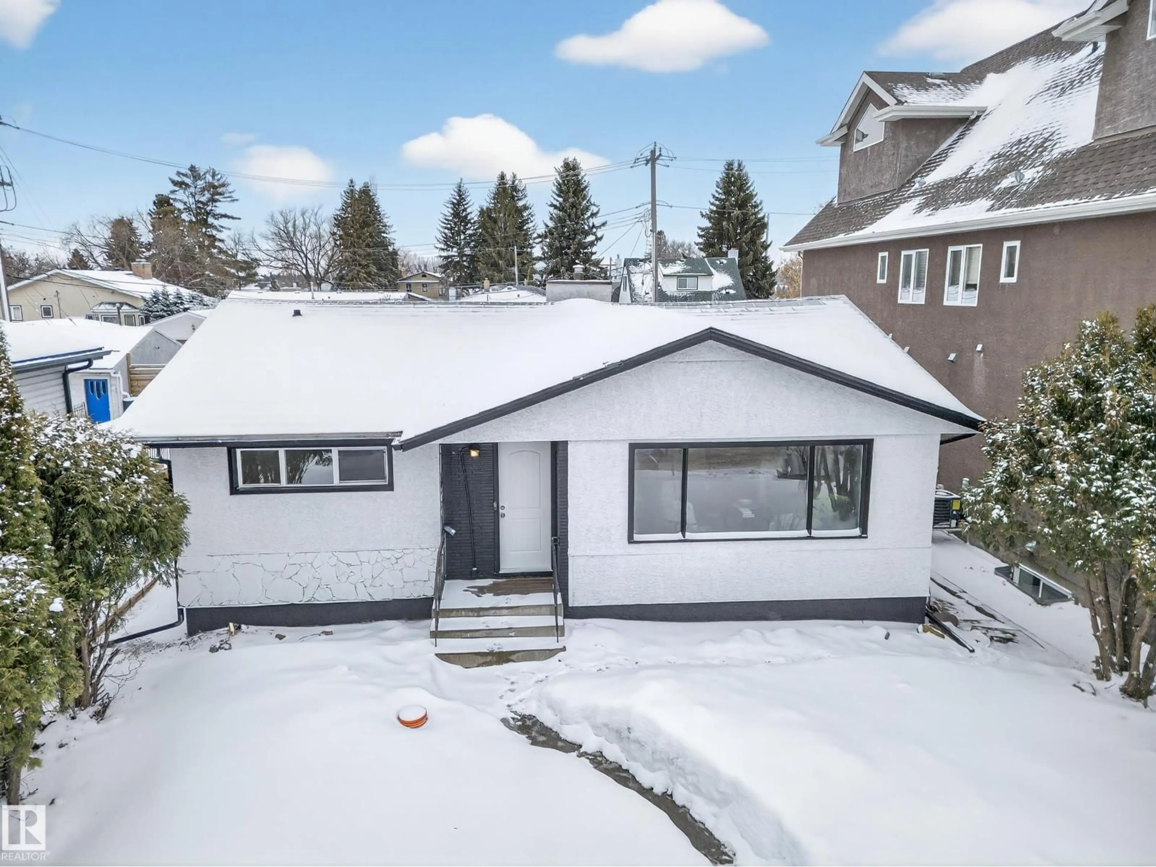 A pic from outside/outdoor area/front of a property/back of a property/a pic from drone, street for 4841 114 AV, Edmonton Alberta T5W0T7