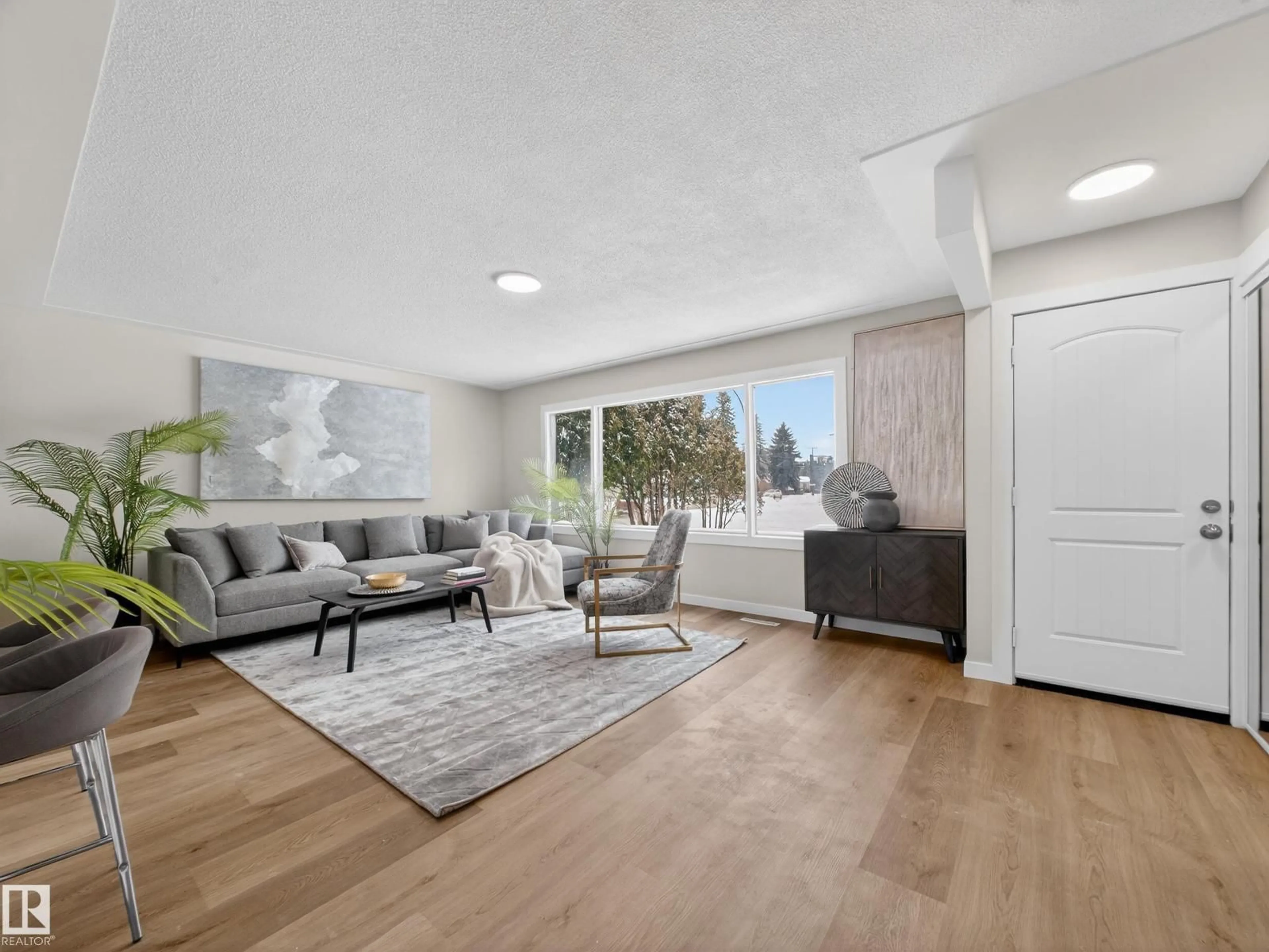 Living room with furniture, unknown for 4841 114 AV, Edmonton Alberta T5W0T7