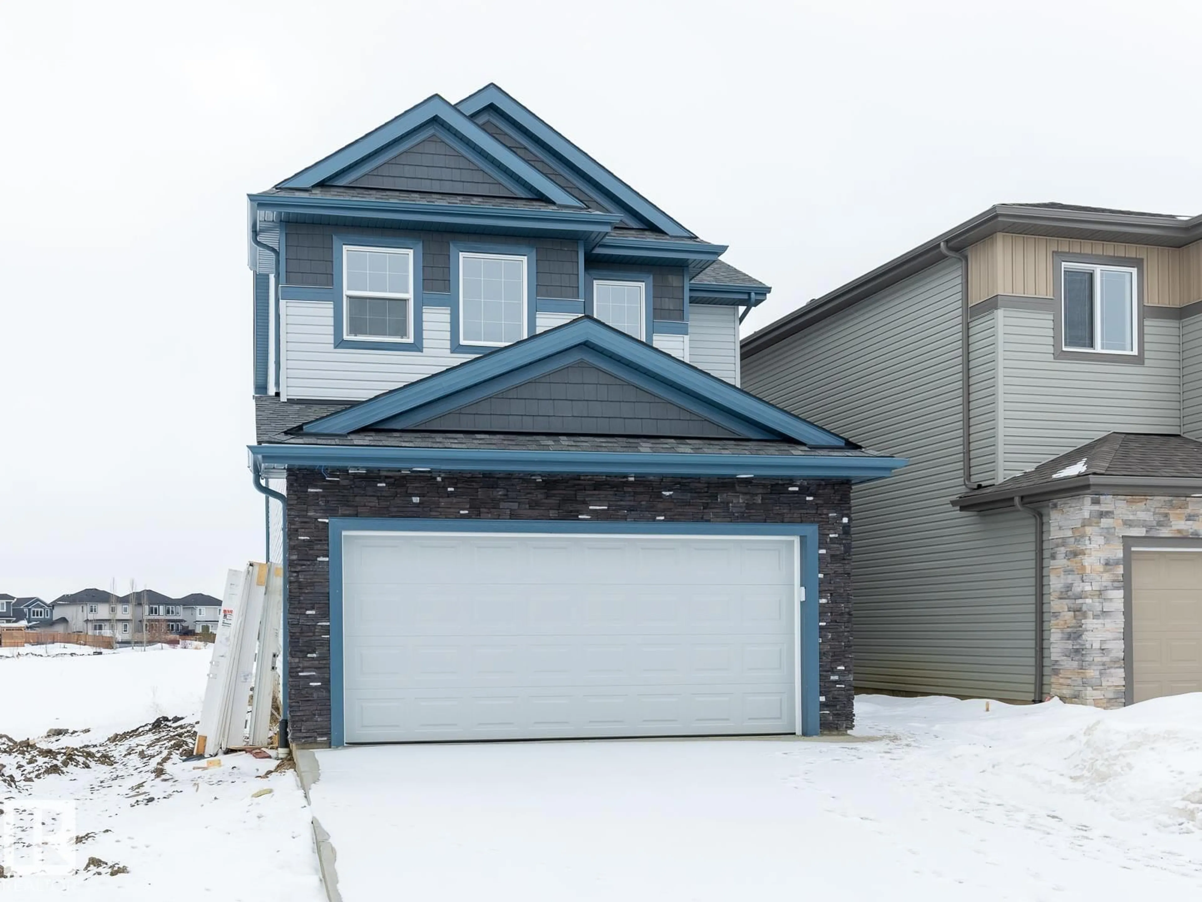 Home with vinyl exterior material, street for 75 DANSEREAU WAY, Beaumont Alberta T5A0E1
