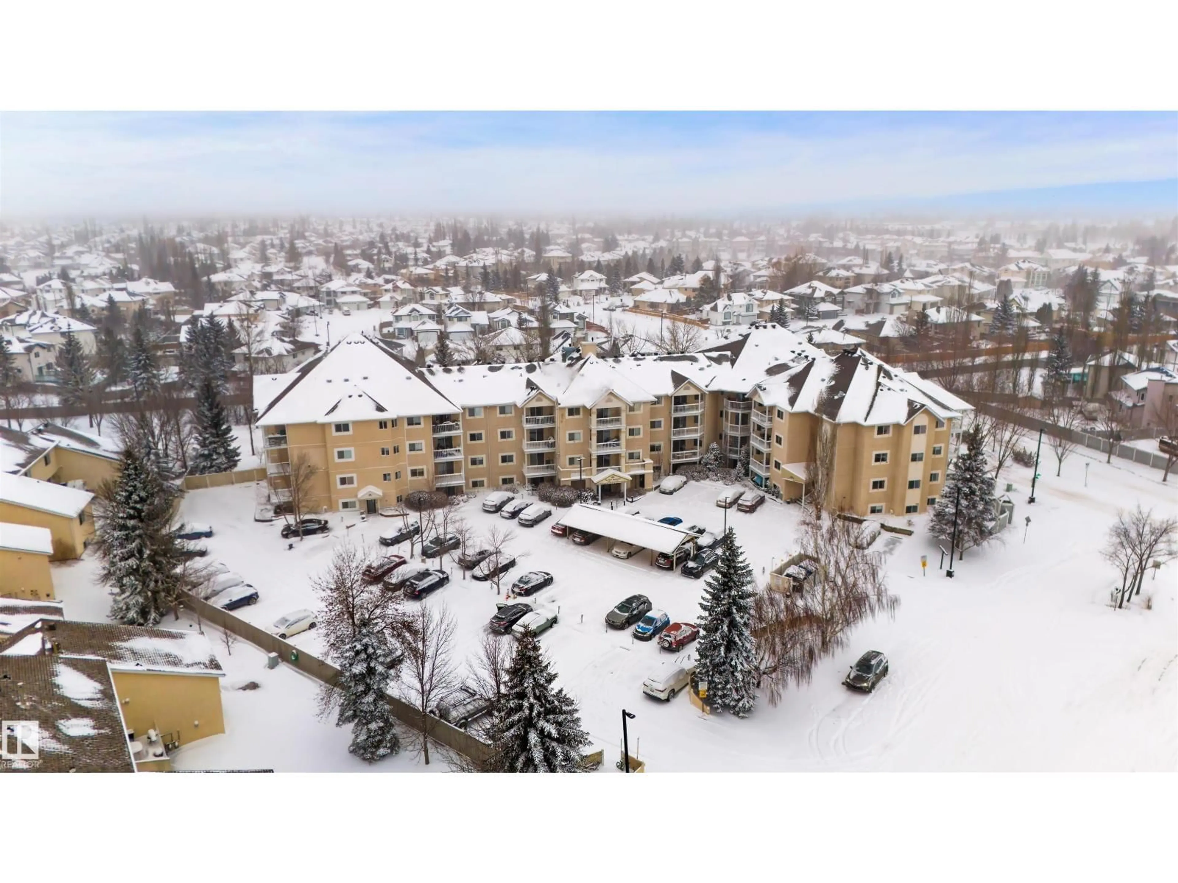 A pic from outside/outdoor area/front of a property/back of a property/a pic from drone, mountain view for #312 - 11620 9A AV NW, Edmonton Alberta T6J7B4