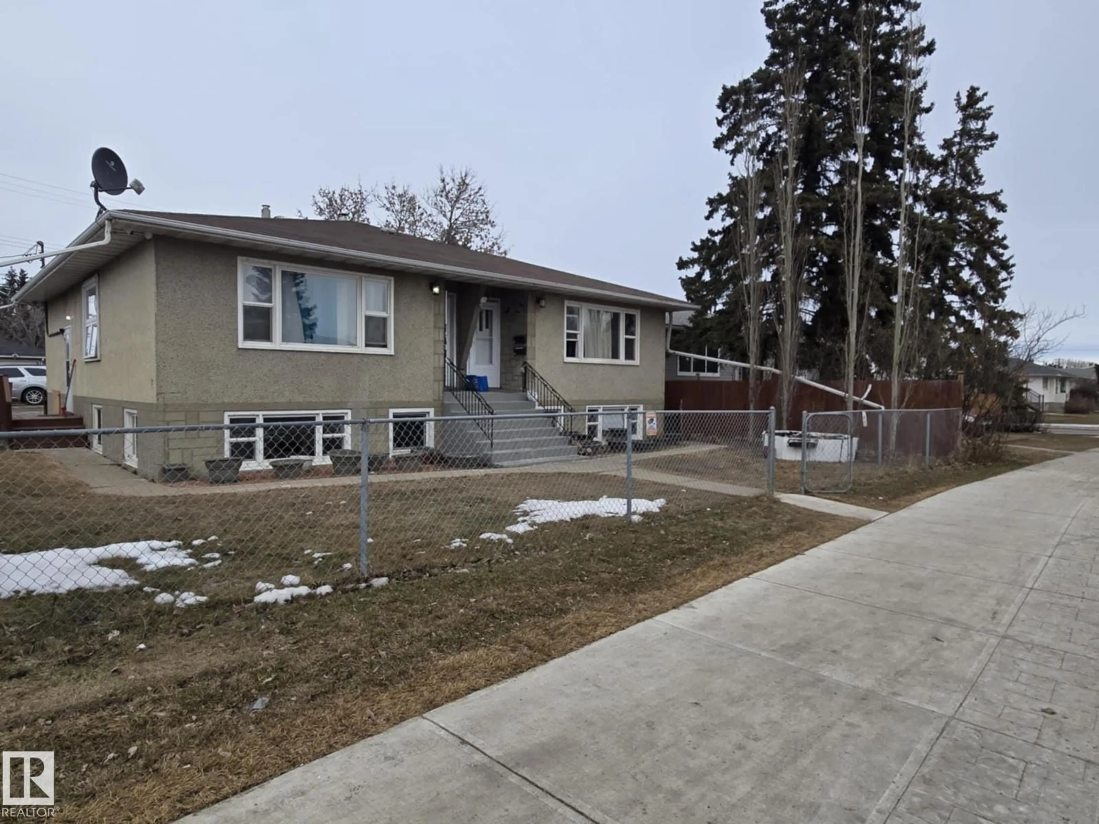 A pic from outside/outdoor area/front of a property/back of a property/a pic from drone, street for 6422 132 AV, Edmonton Alberta T5A0J8