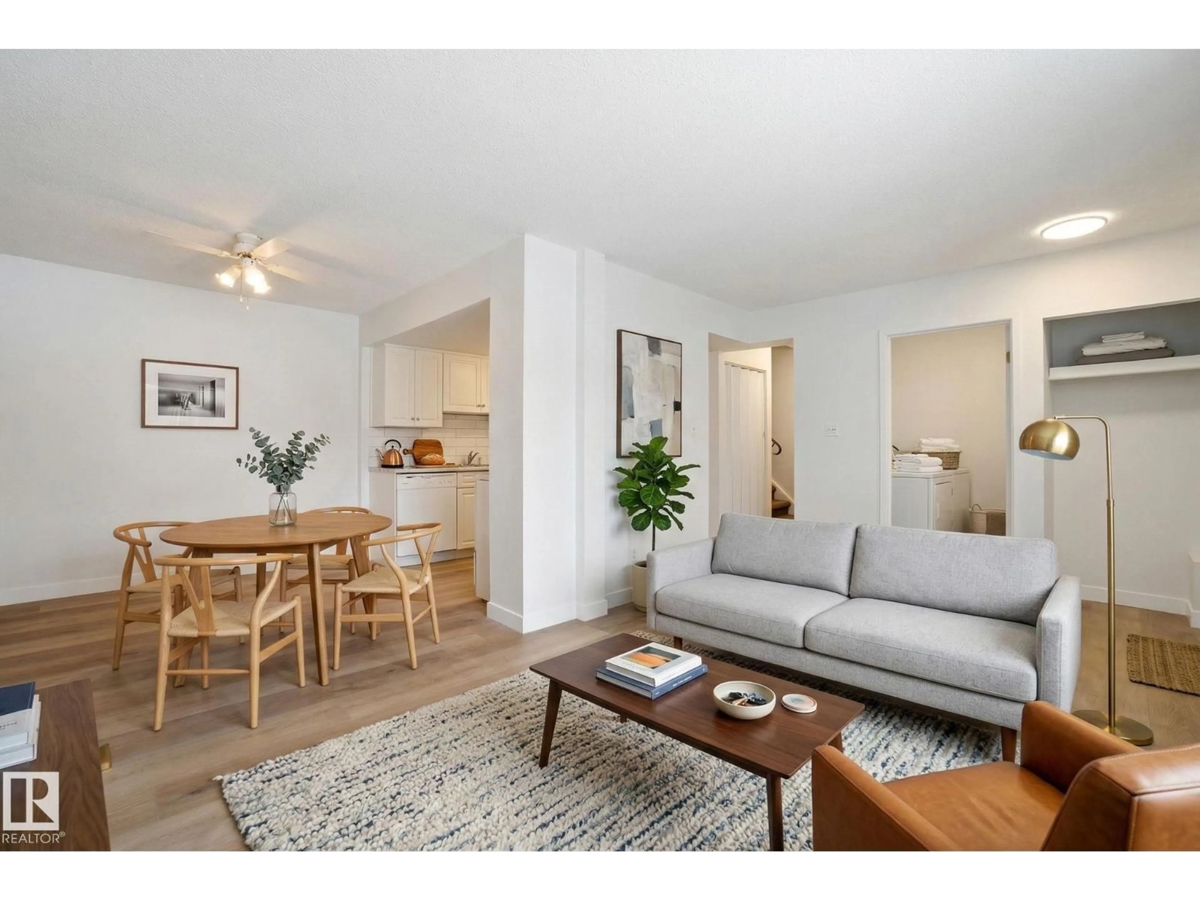 Living room with furniture, wood/laminate floor for #308 - 2908 116A AV, Edmonton Alberta T5W4R7