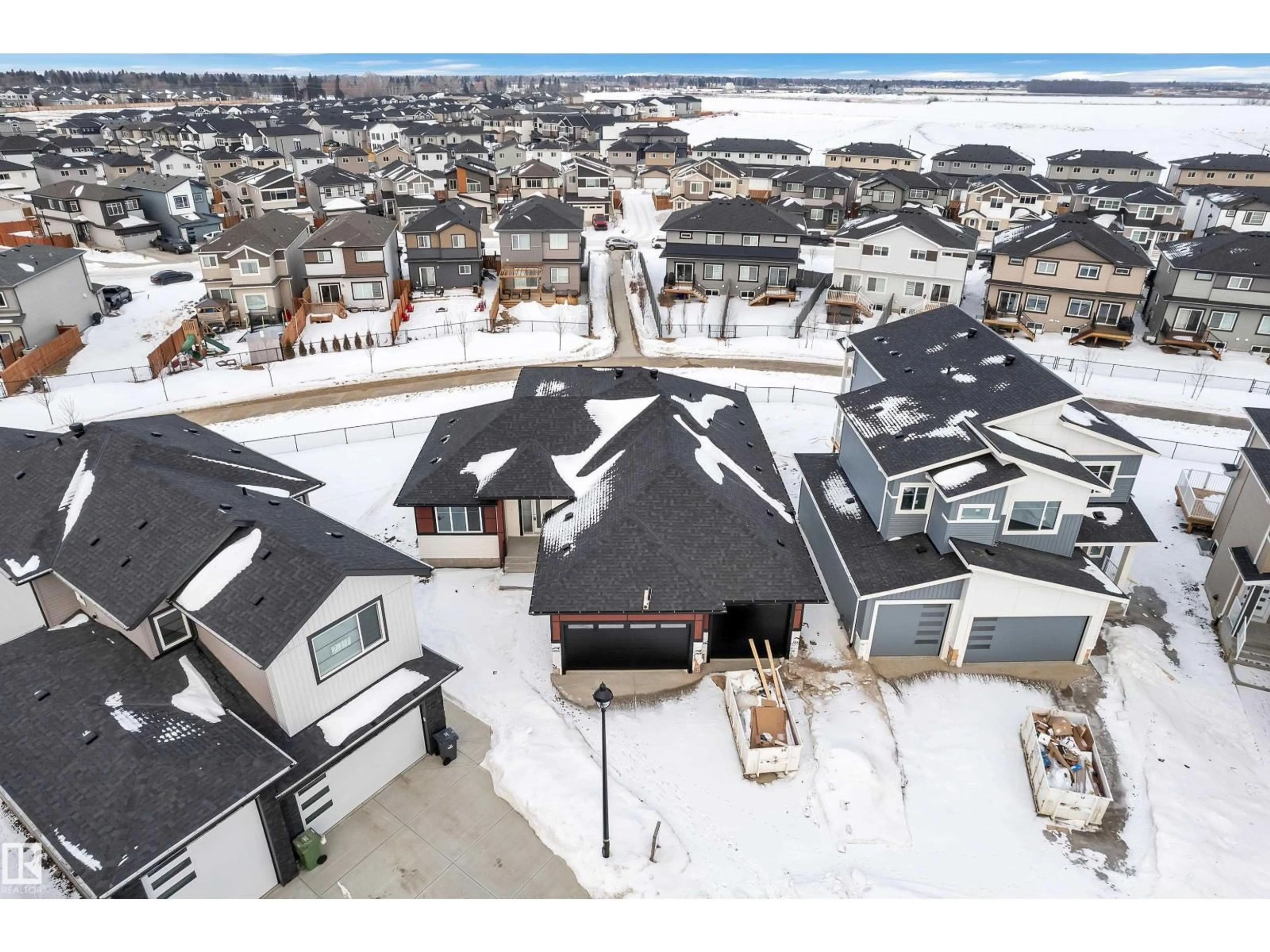 A pic from outside/outdoor area/front of a property/back of a property/a pic from drone, street for 215 BASIN CO, Leduc Alberta T9E1T6