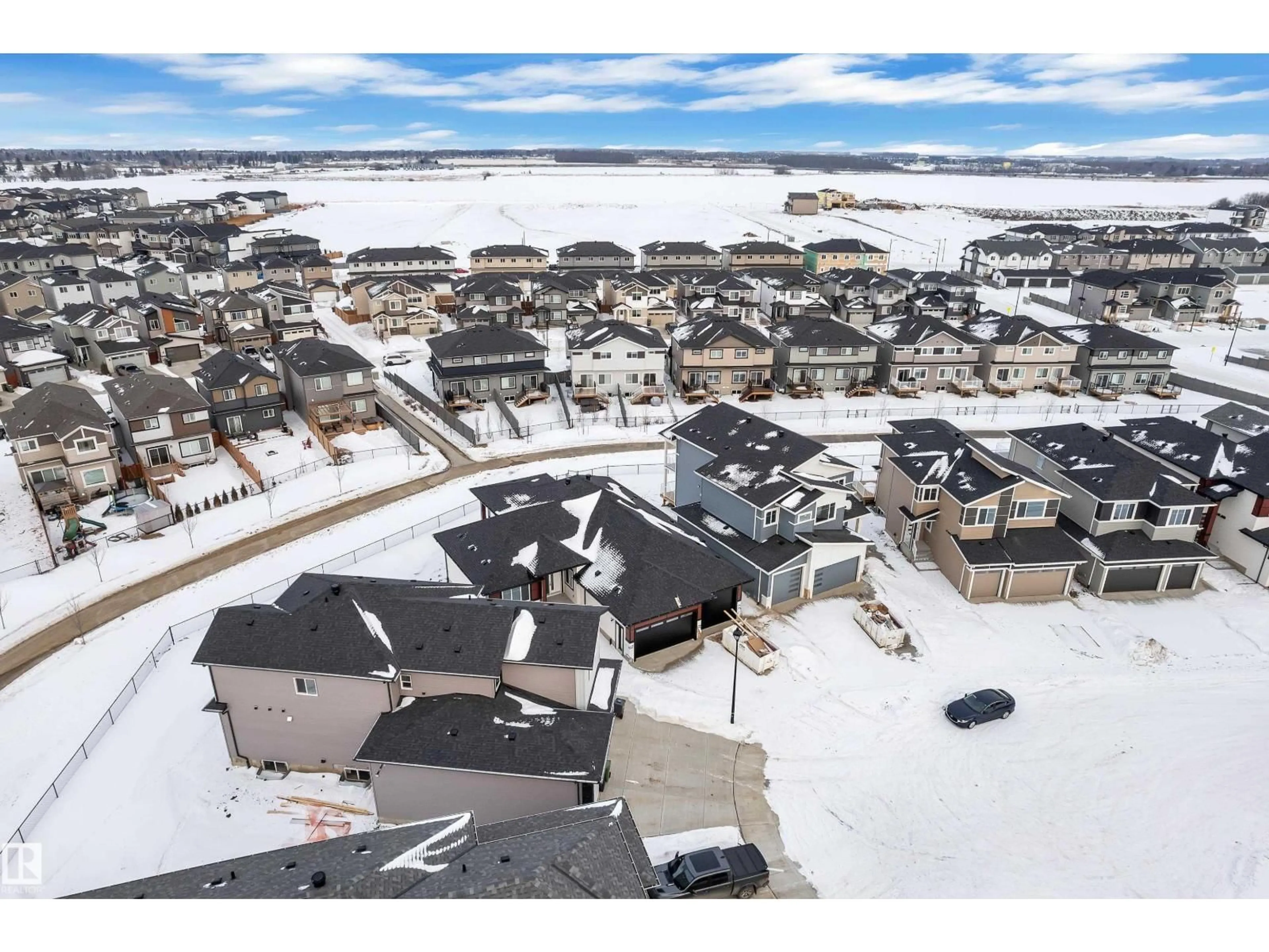 A pic from outside/outdoor area/front of a property/back of a property/a pic from drone, street for 215 BASIN CO, Leduc Alberta T9E1T6