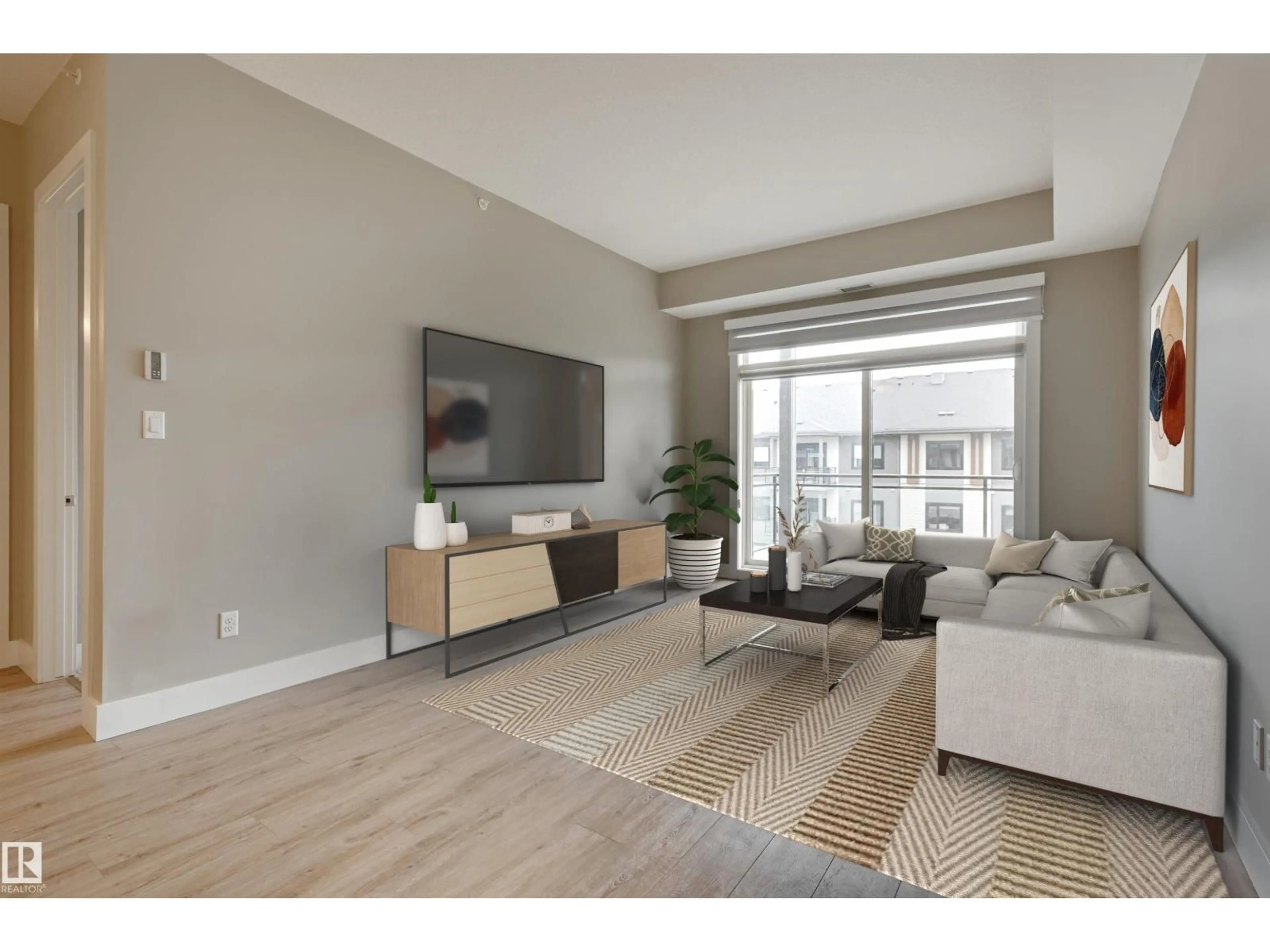 Living room with furniture, unknown for 406 - 528 GRIESBACH PR, Edmonton Alberta T5E6X2