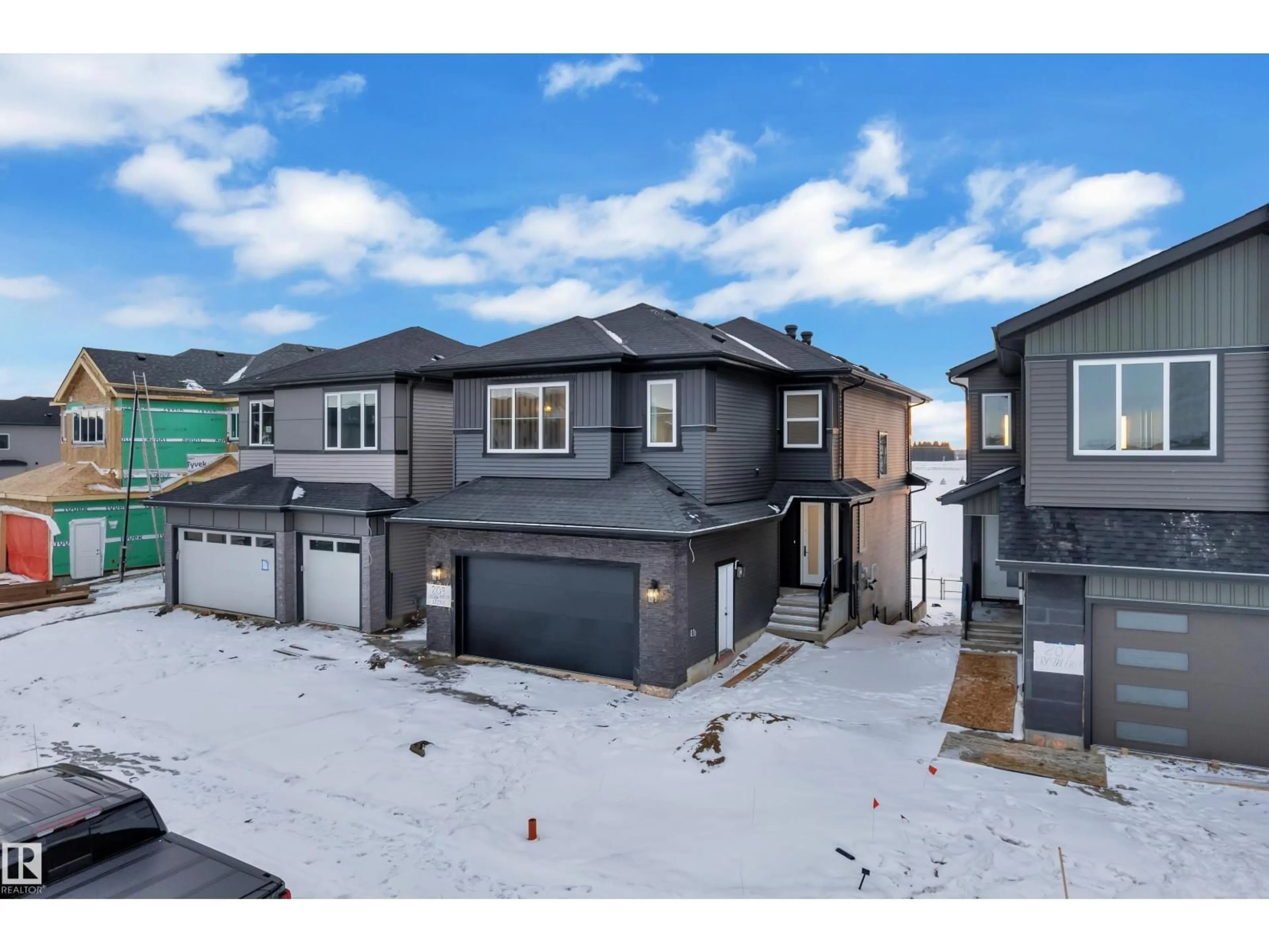 A pic from outside/outdoor area/front of a property/back of a property/a pic from drone, street for 209 CRYSTAL CREEK DRIVE, Leduc Alberta T9E0X6
