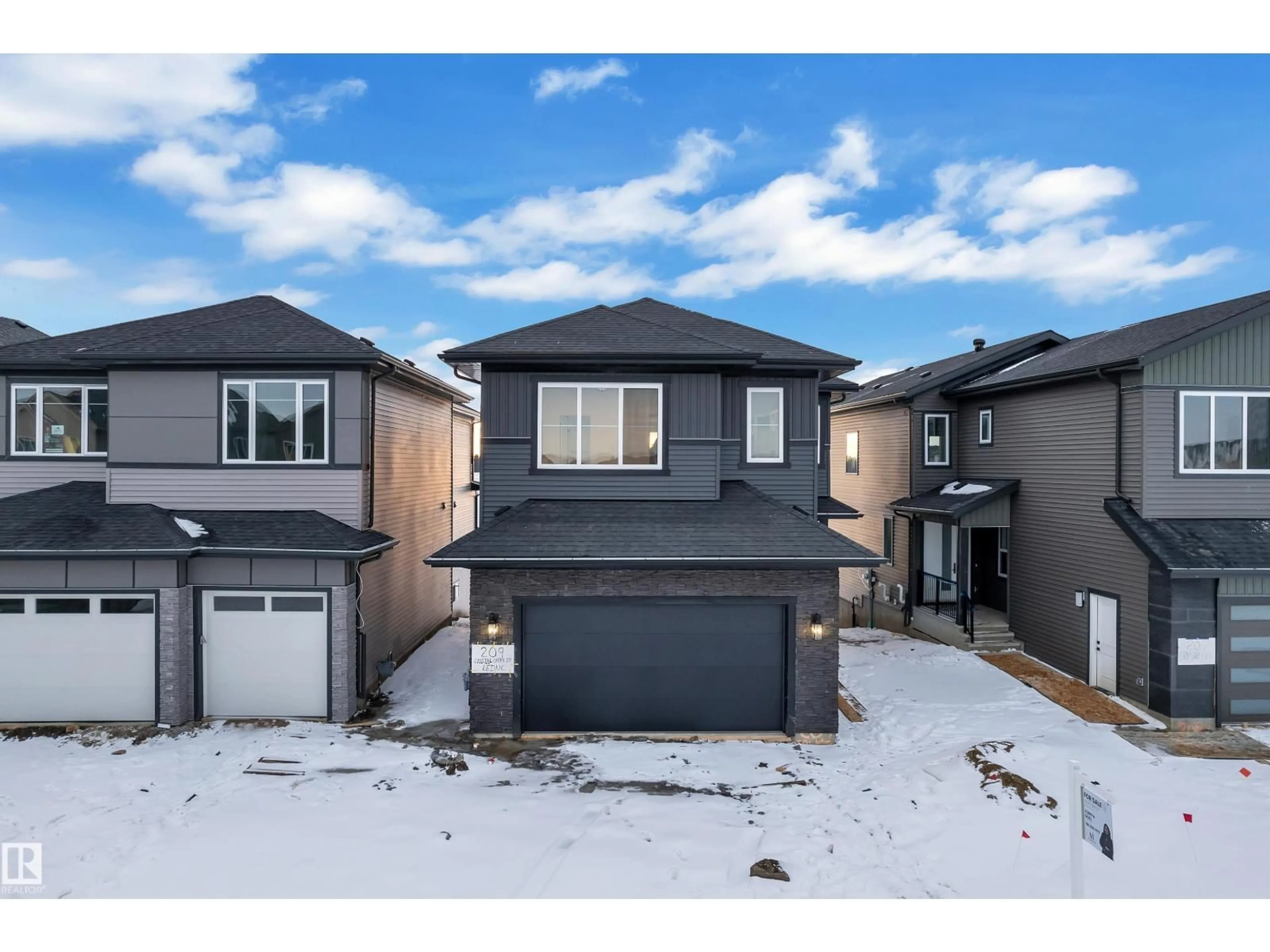 A pic from outside/outdoor area/front of a property/back of a property/a pic from drone, street for 209 CRYSTAL CREEK DRIVE, Leduc Alberta T9E0X6