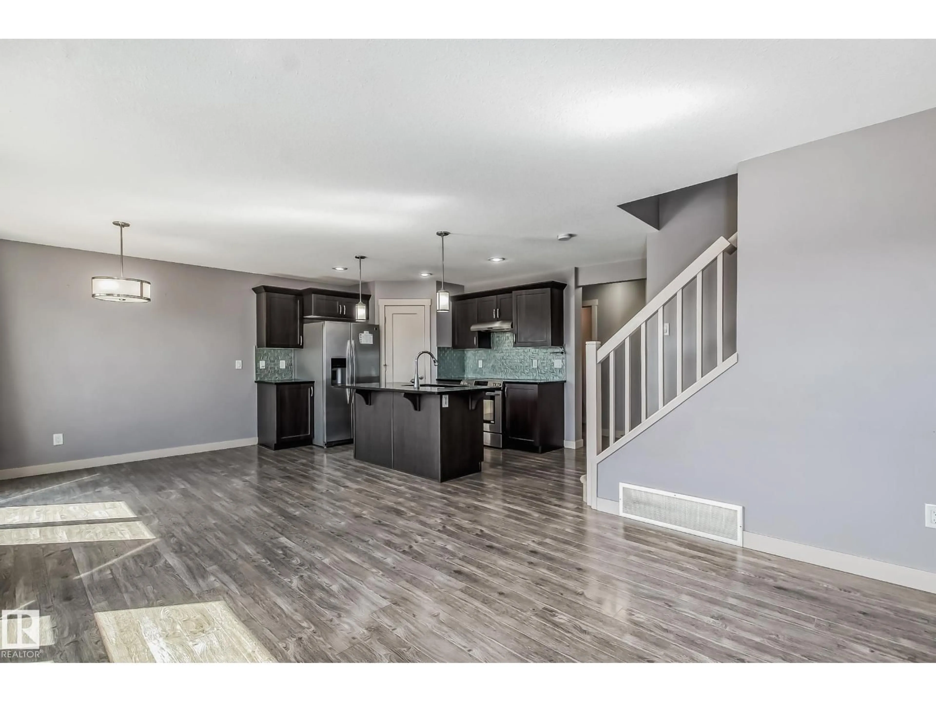 Open concept kitchen, unknown for 1669 HAMMOND CR, Edmonton Alberta T6M0N3