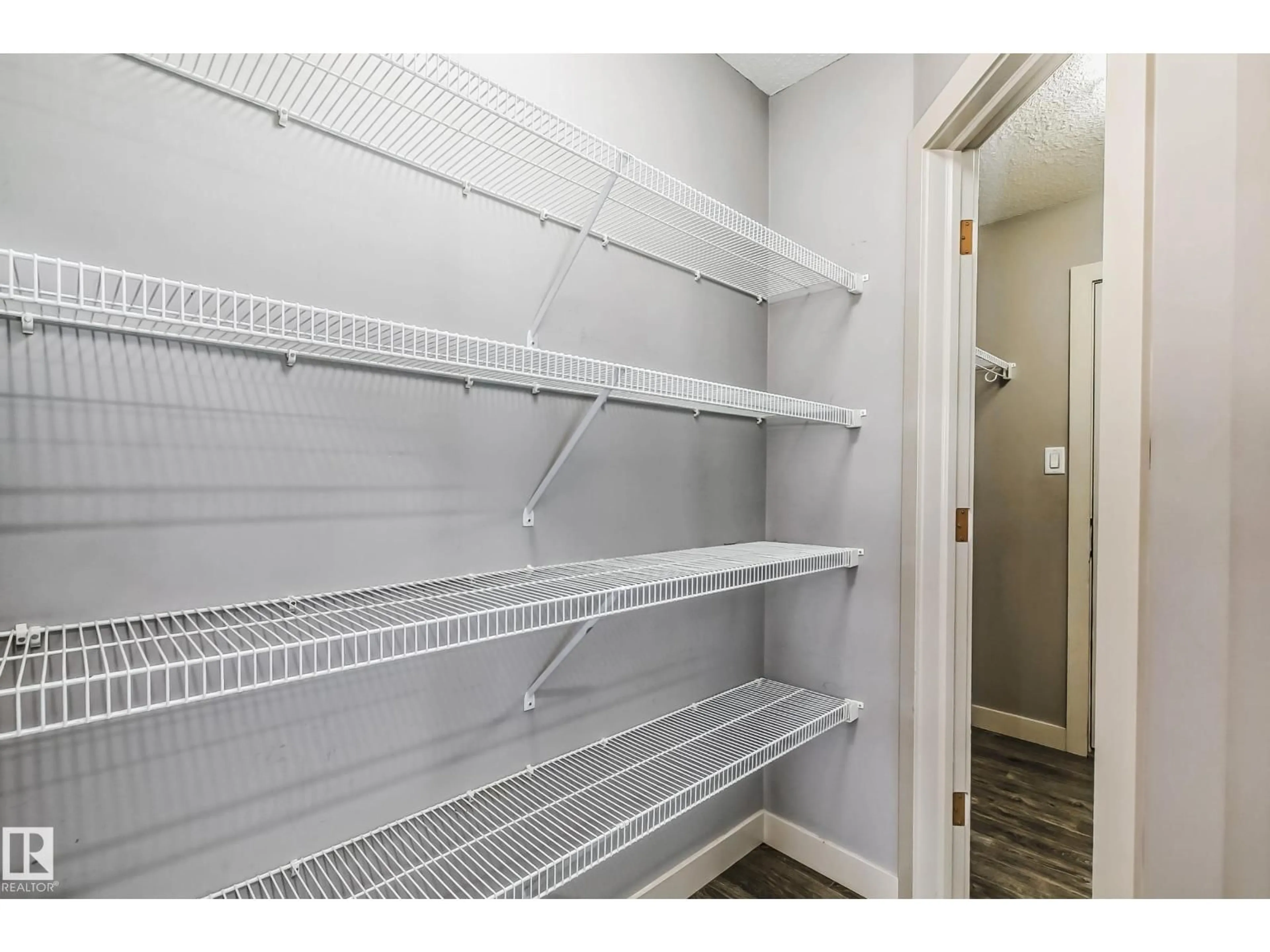 Storage room or clothes room or walk-in closet for 1669 HAMMOND CR, Edmonton Alberta T6M0N3