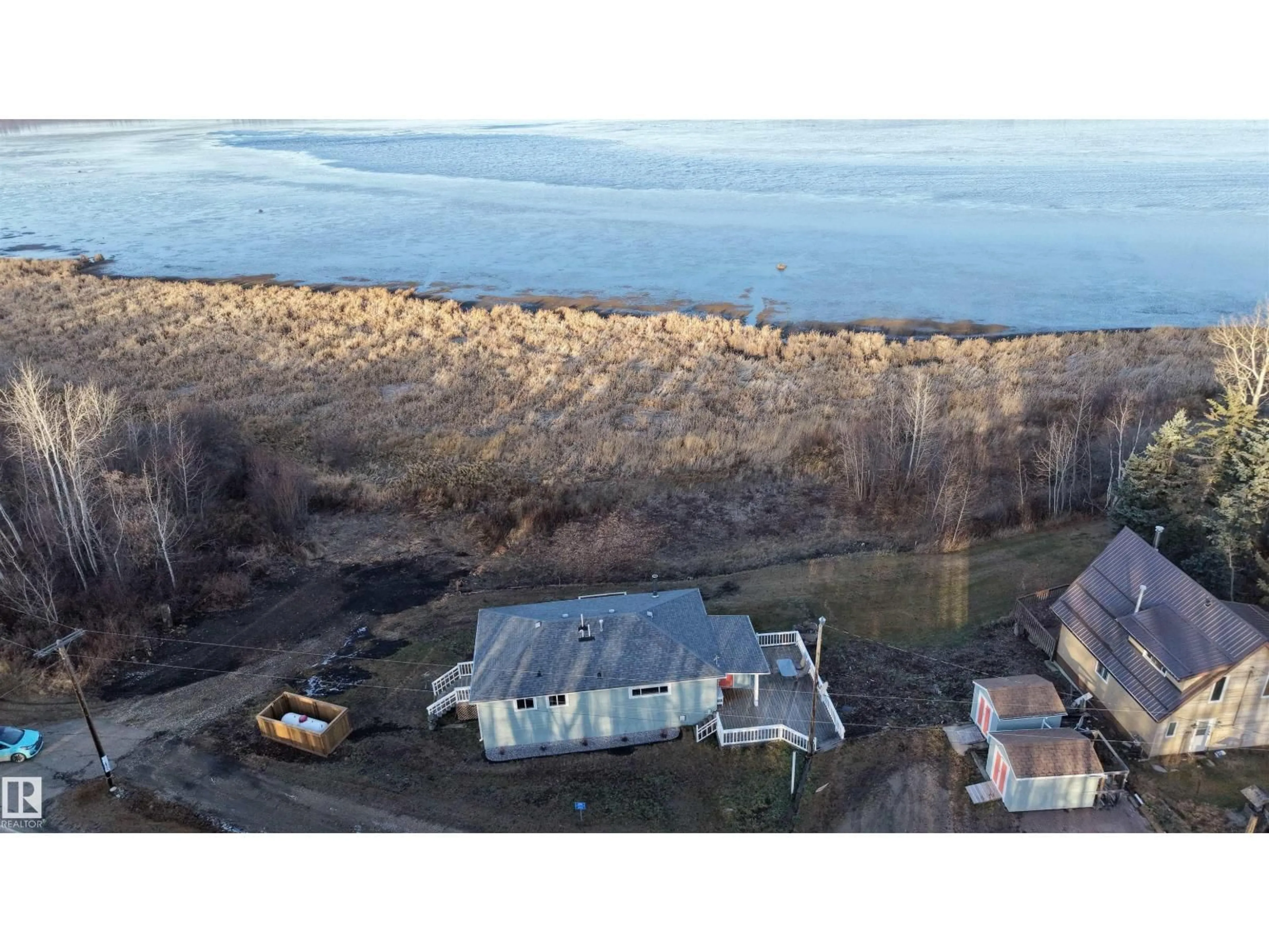 A pic from outside/outdoor area/front of a property/back of a property/a pic from drone, water/lake/river/ocean view for 490 & 492 LAKEVIEW DRIVE, Rural Lac Ste. Anne County Alberta T0E1V0
