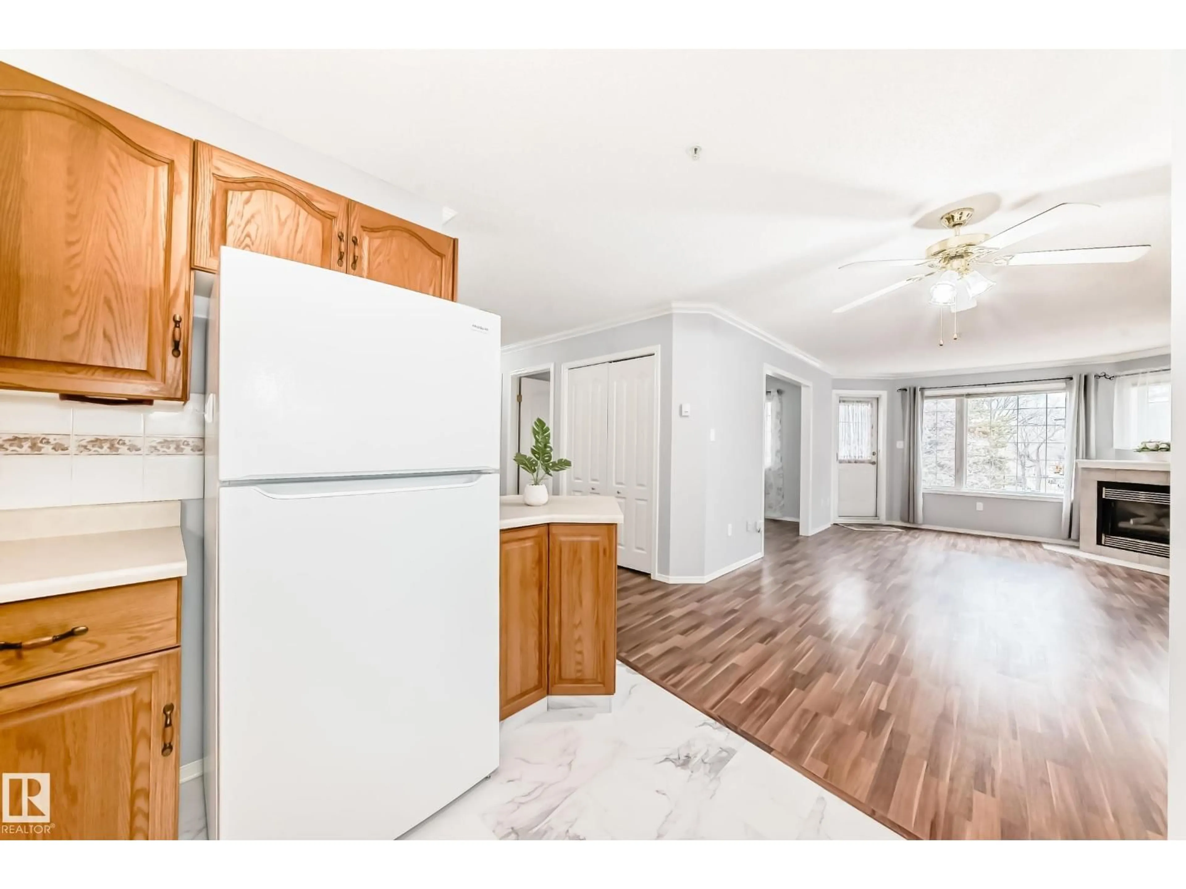 Open concept kitchen, wood/laminate floor for #302 - 13450 114 AV, Edmonton Alberta T5M4C4