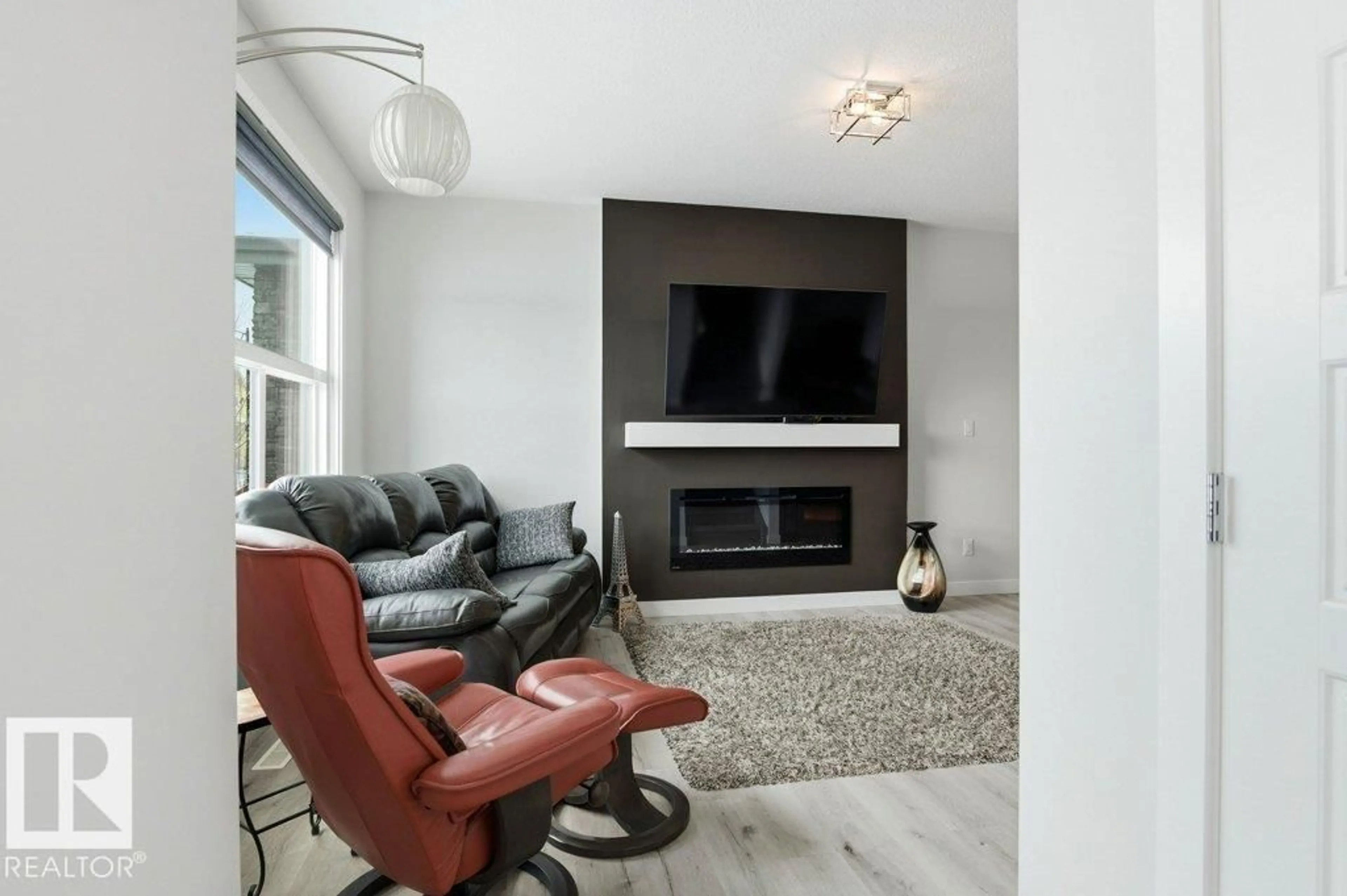 Living room with furniture, unknown for SW - 8018 KIRIAK LI, Edmonton Alberta T6W4V1