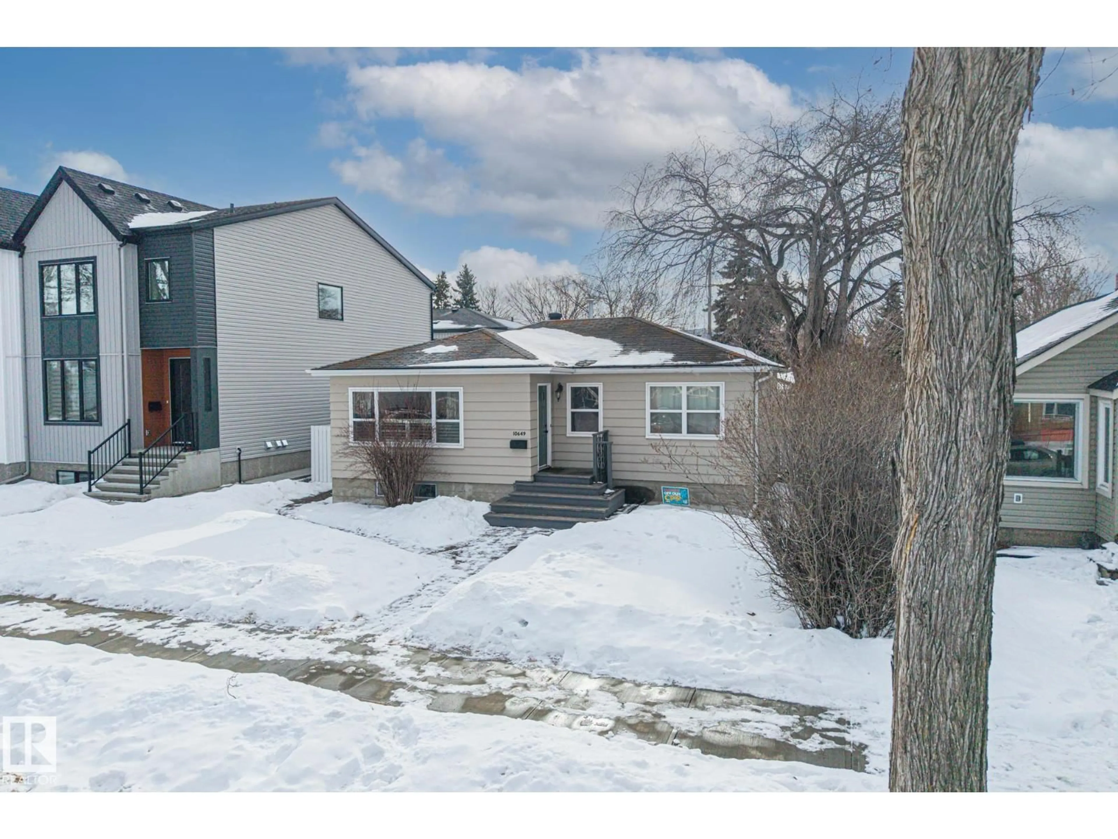 A pic from outside/outdoor area/front of a property/back of a property/a pic from drone, street for 10649 64 AV, Edmonton Alberta T6H1T1