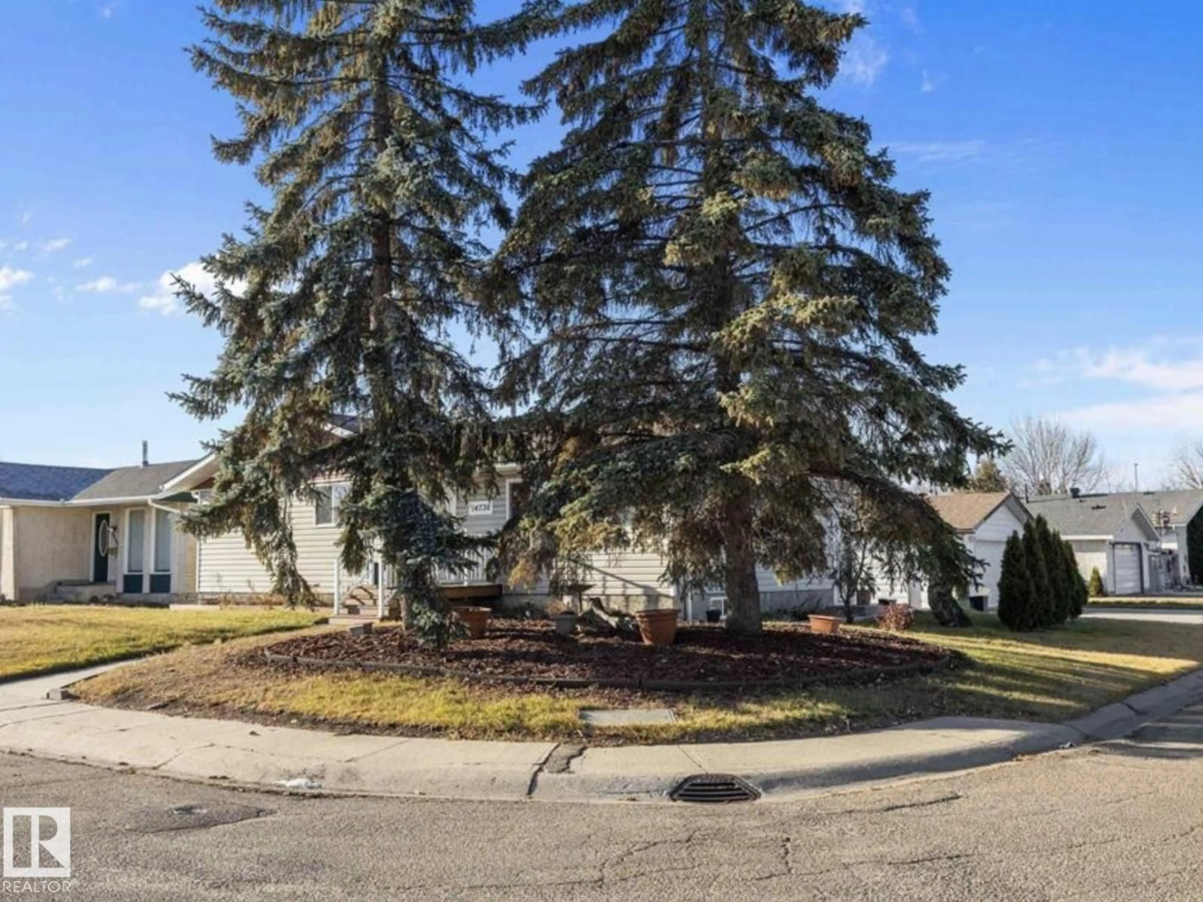 A pic from outside/outdoor area/front of a property/back of a property/a pic from drone, street for NW - 14736 122 ST, Edmonton Alberta T5X1V9