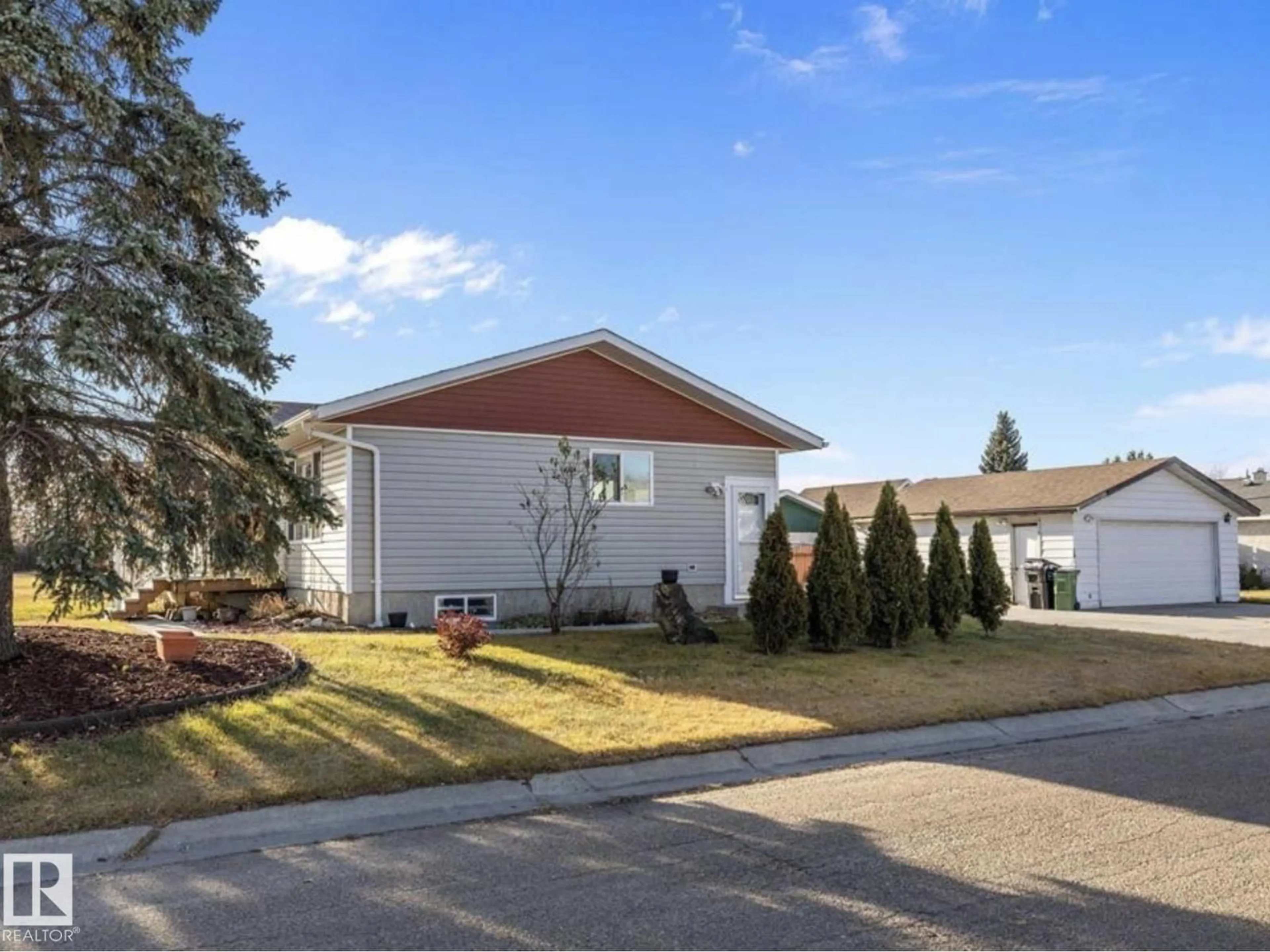 Home with vinyl exterior material, street for NW - 14736 122 ST, Edmonton Alberta T5X1V9